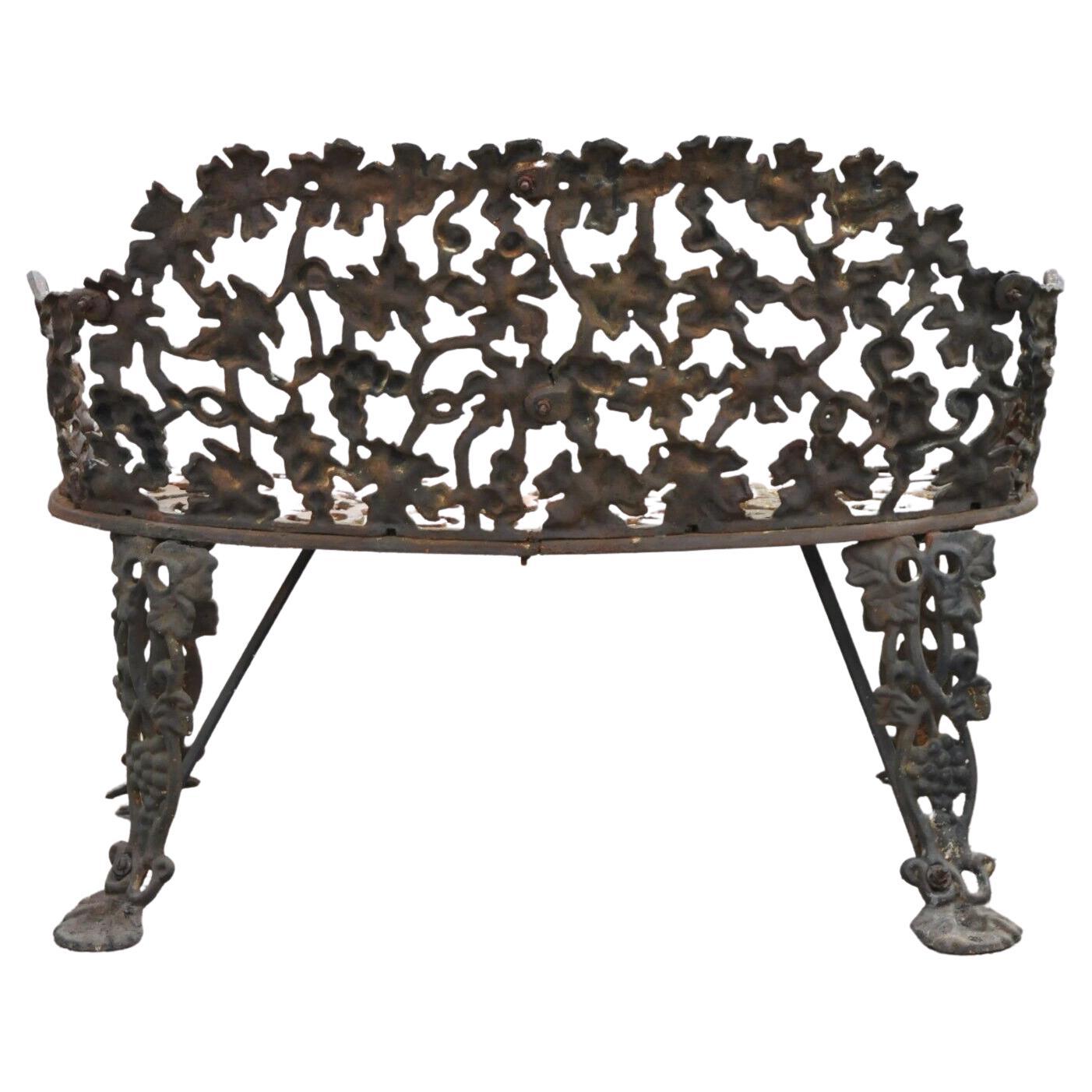 Antique French Victorian grape vine leaf cast iron small garden bench loveseat. Item features cast iron construction, very nice antique item, quality craftsmanship, great style and form. Circa early to mid 20th century.
Measurements: 28.5