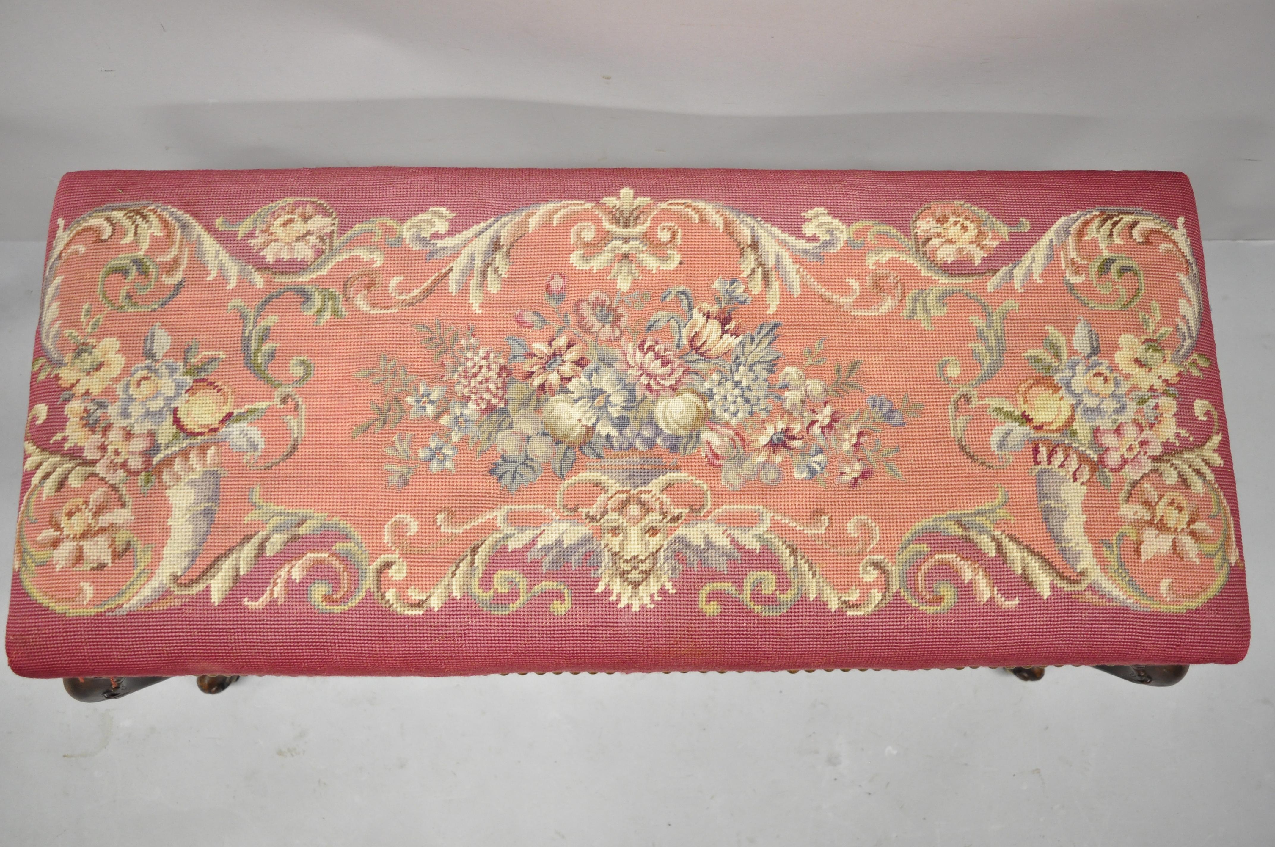 Antique French Victorian pink floral needlepoint mahogany cabriole leg bench. Item features pink floral needlepoint upholstery, solid wood frame, beautiful wood grain, cabriole legs, very nice antique item, quality American craftsmanship. Circa