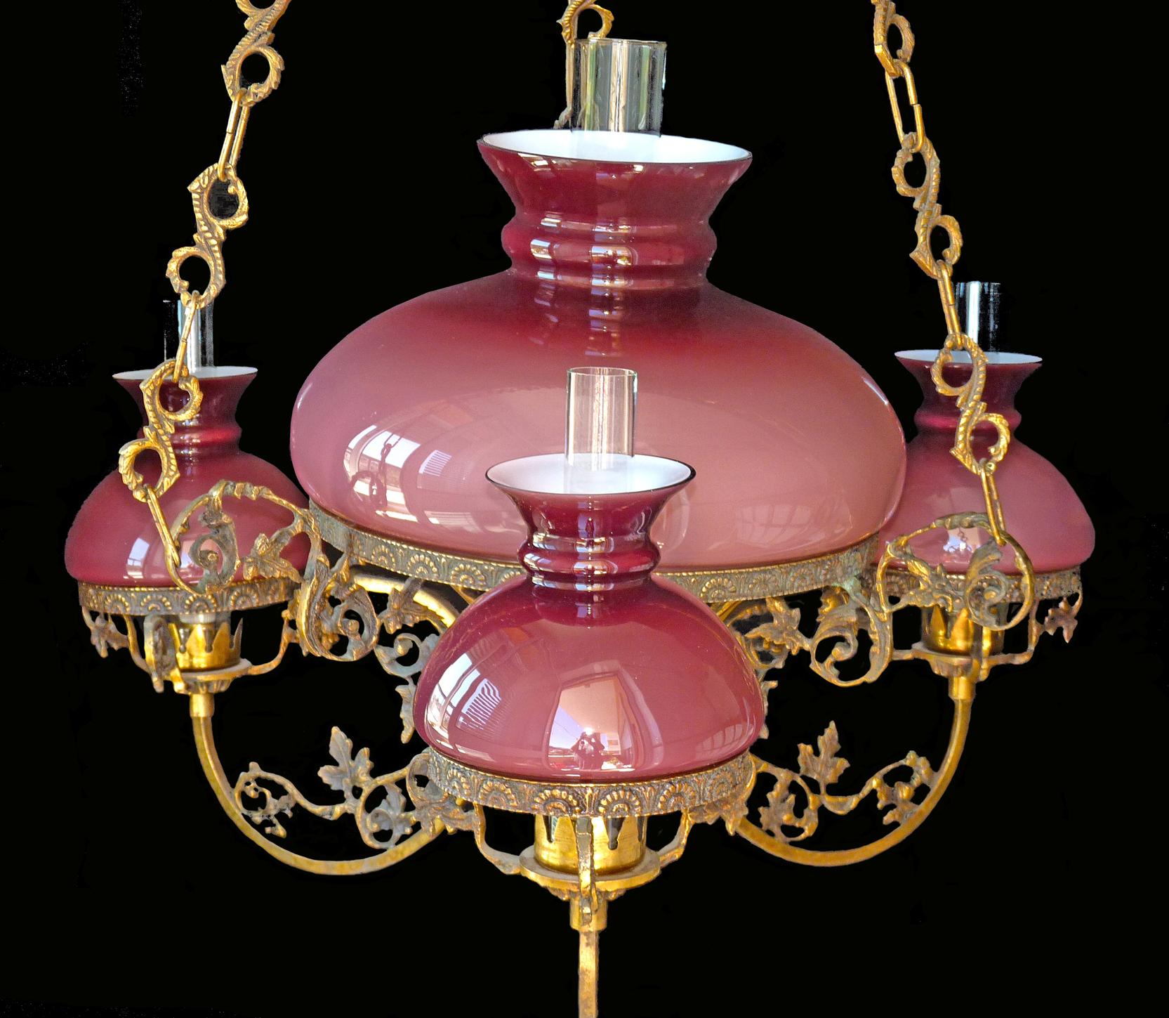 Gorgeous antique circa 1940 French Victorian four-light bulbs chandelier with opaline pink cased glass and chiselled gilt bronze/ brass.
Measures:
Diameter 30 in / 76 cm
Height 37 in / 95 cm
Diameter glass shades: 14 in (36 cm)/ 9 in (23 cm)/