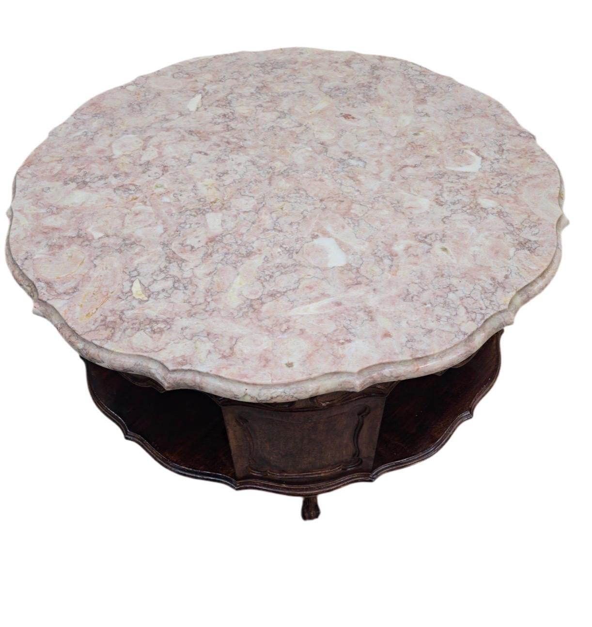 Antique French Victorian Rotating Pink Marble Top Drum Table

Gorgeous Antique French Victorian Pink Beveled Edge Sunburst Marble Top with Rotating Hand-Carved Mahogany Storage Cubby-Hole Display Center and Hand Carved Curved Leg Pedestal Base