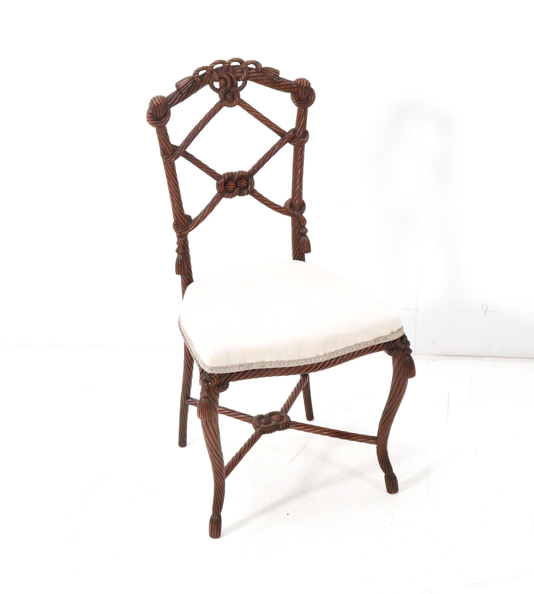 Magnificent and ultra rare Victorian side chair.
Striking French design from the 1890s.
Original hand-carved walnut frame and re-upholstered with a quality fabric.
This wonderful Victorian side chair is in very good original condition with minor