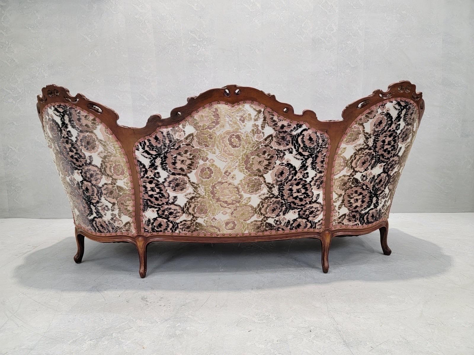 Carved Antique French Victorian Walnut Tufted Back Bergere Sofa Newly Upholstered For Sale