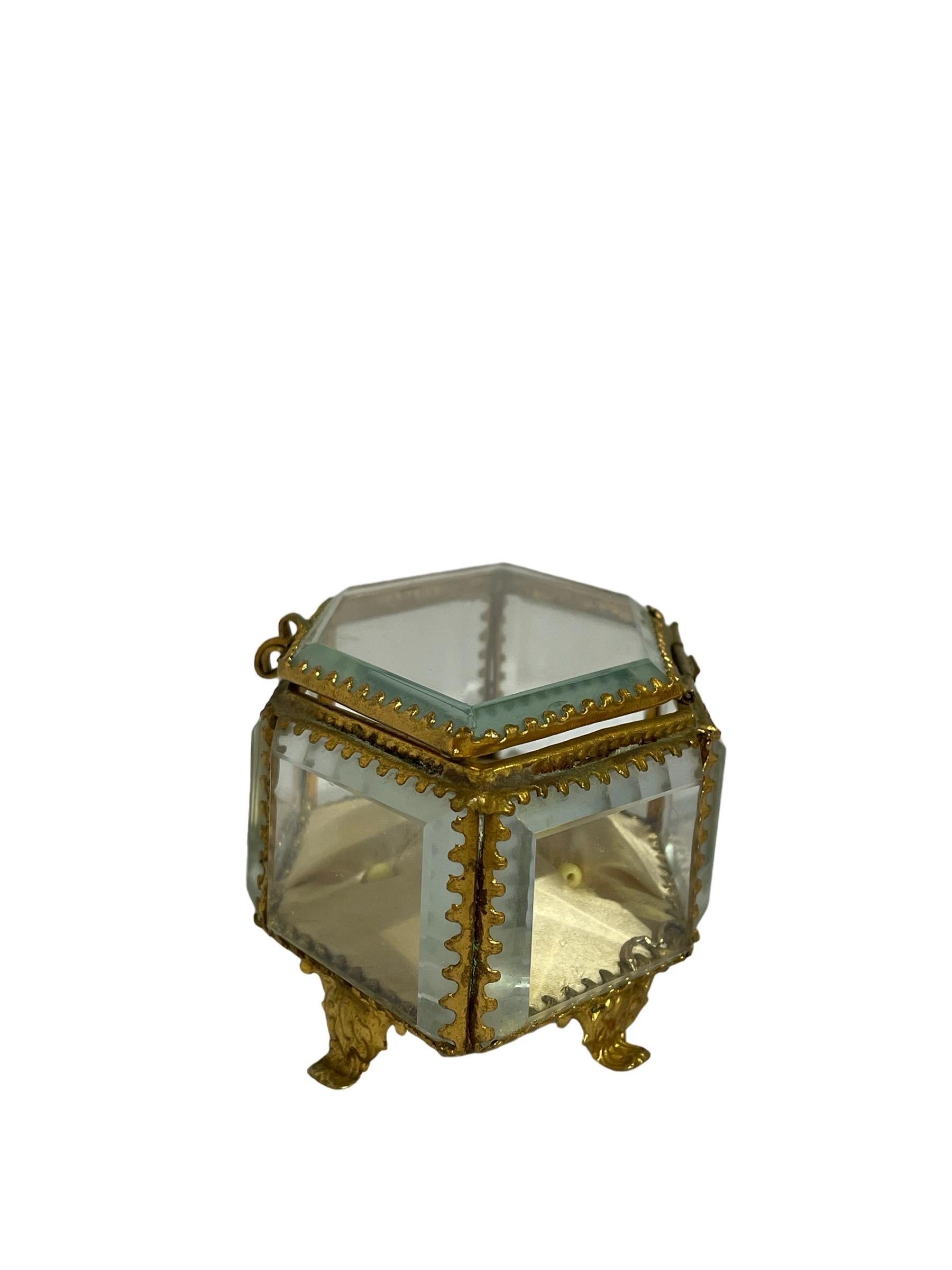 Antique French Victorian Yellow Tufted Jewelry Box 

Amazing rare hexagon shaped French Victorian small antique beveled glass and gilt metal jewelry casket. 

Small gap when closed and small chip on upper left corner. Very old piece with slight