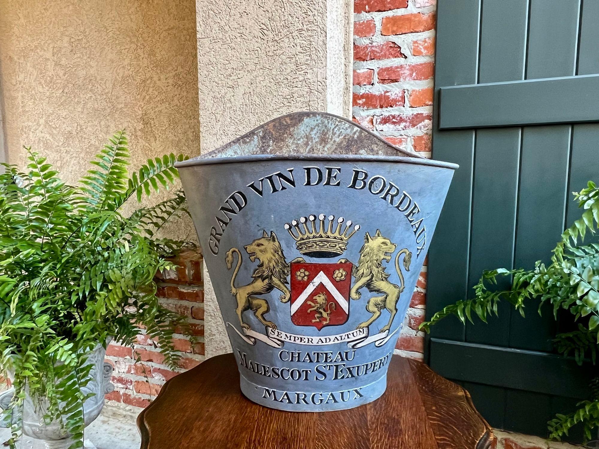 Antique French Vineyard Grape Hod Wine Bucket Chateau Margaux Winery Floral Urn.

Direct from France, a wonderful antique metal grape hod or “hotte”, with stunning hand painted French designed artwork. In the 19th century French vineyards, these