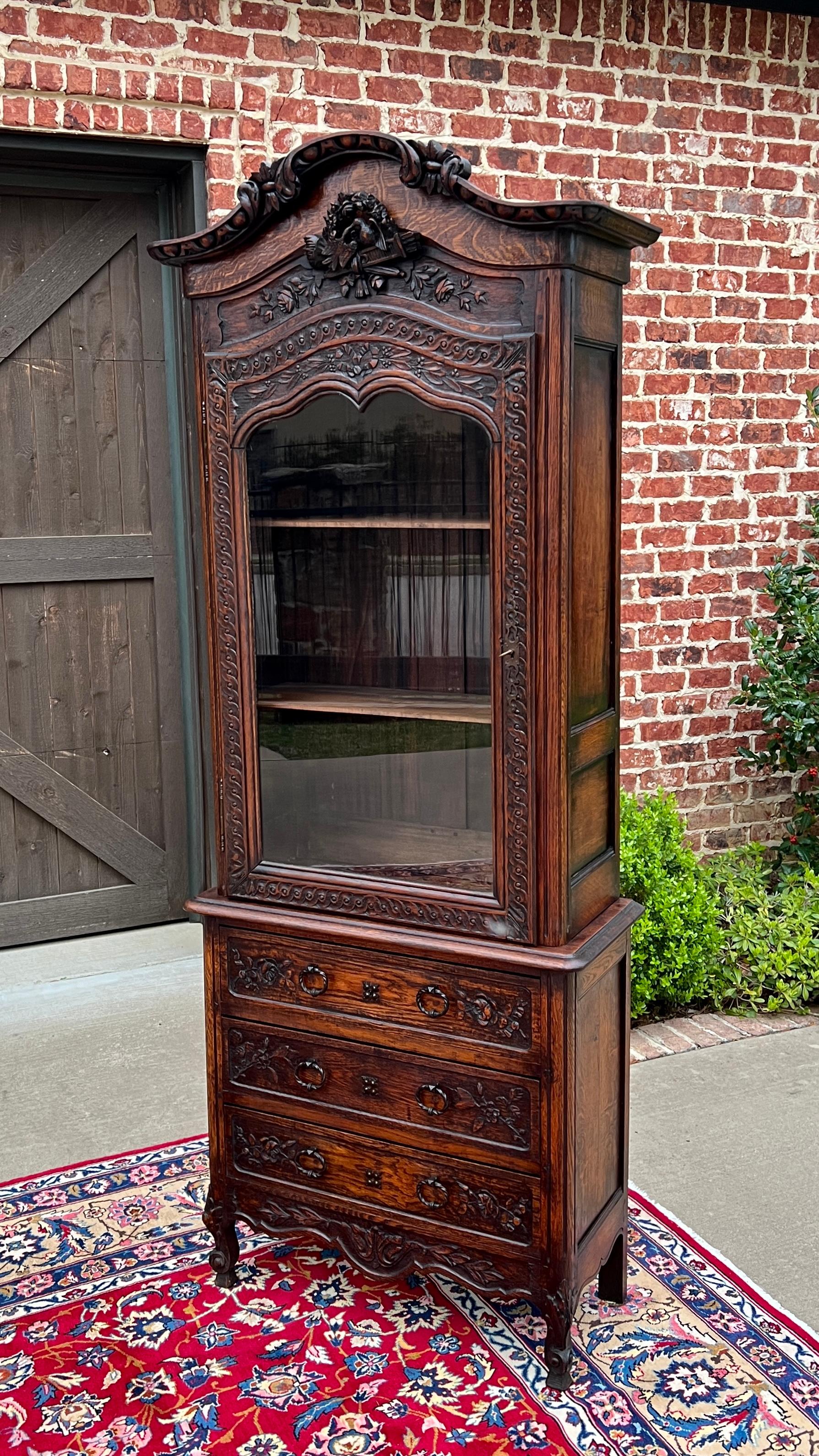 BEAUTIFUL Antique French Country Carved Oak Bonnet Top Bookcase, Bonnetiere or Vitrine Over 3 Drawer Chest ~~HIGHLY CARVED~~c. 1870s

Versatile size~~SLIM profile fits in smaller spaces~~84