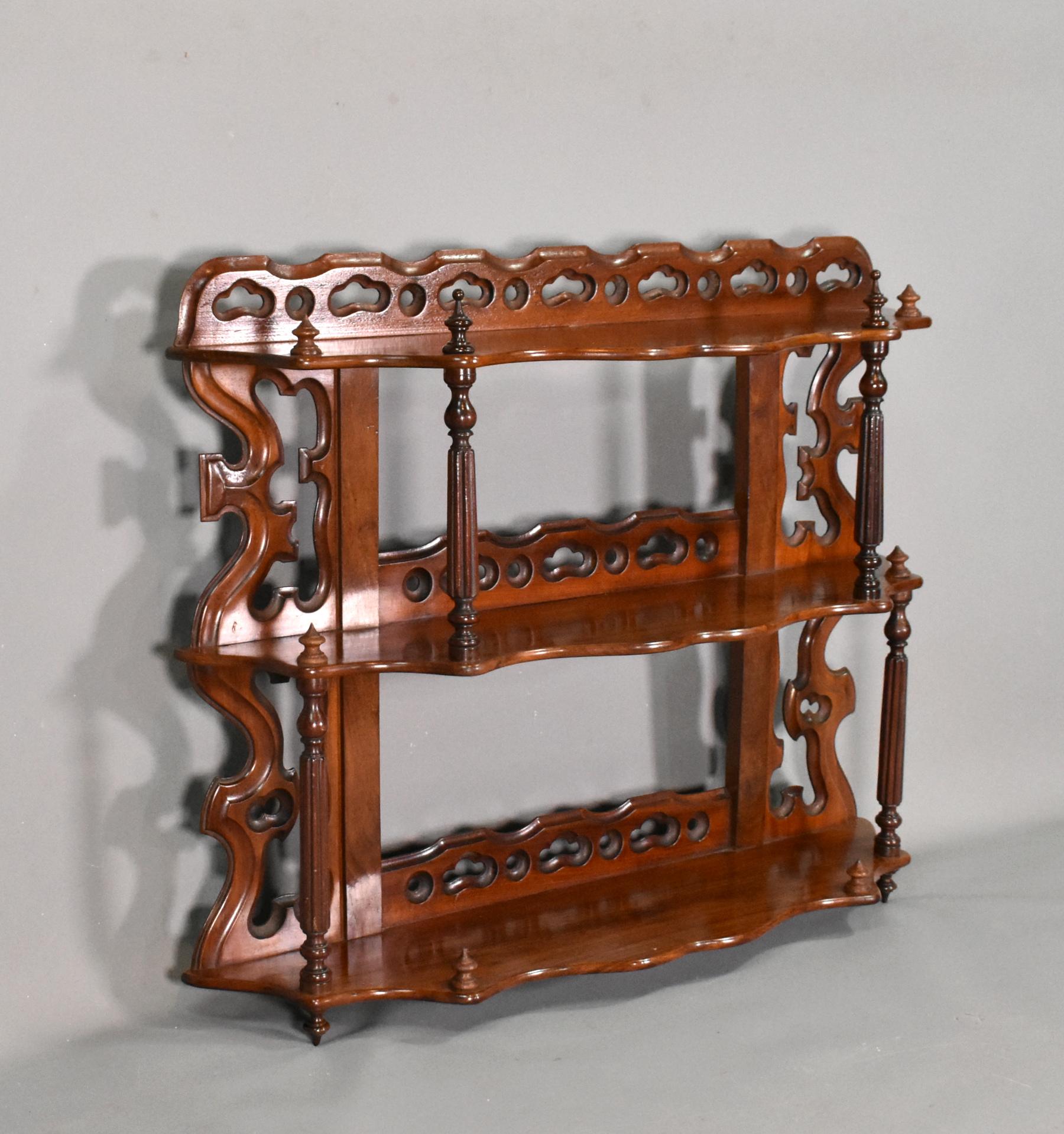 Antique French wall hanging shelves Etagere Louis Philippe Style 19th Century

This beautifully designed Wall Shelf is made of solid mahogany with three matching shelves divided by accurately turned columns of different heights. 

Each shelf