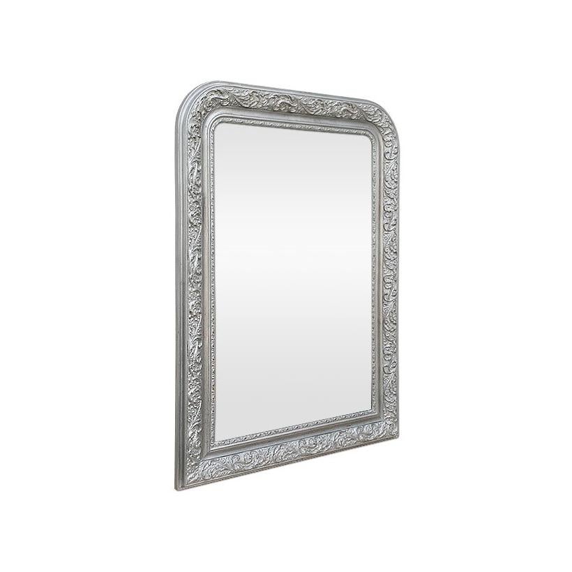 Antique french wall mirror, Louis-Philippe style. Re-gilding to the patinated silvered leaf, decoration of the antique frame with leafs and small flowers. Modern glass mirror. Antique frame width: 10.5 cm.