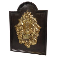 Antique French, acquasantiera a muro in bronzo dorato su pannello, XIX secolo