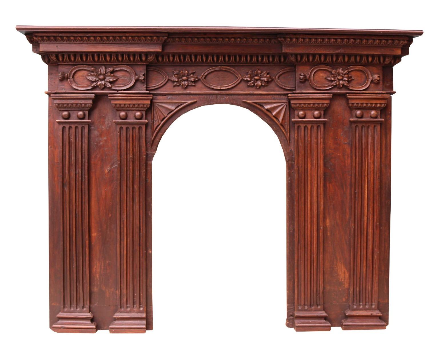 A good quality wooden fire surround with arched opening. Carved frieze panel.

Opening height 86 cm

Opening width 51 cm

Width between legs 131.5 cm.