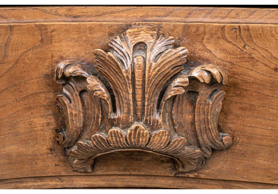 Antique French Walnut Commode With Elaborate Carved Pulls In Distressed Condition For Sale In Bridgeport, CT