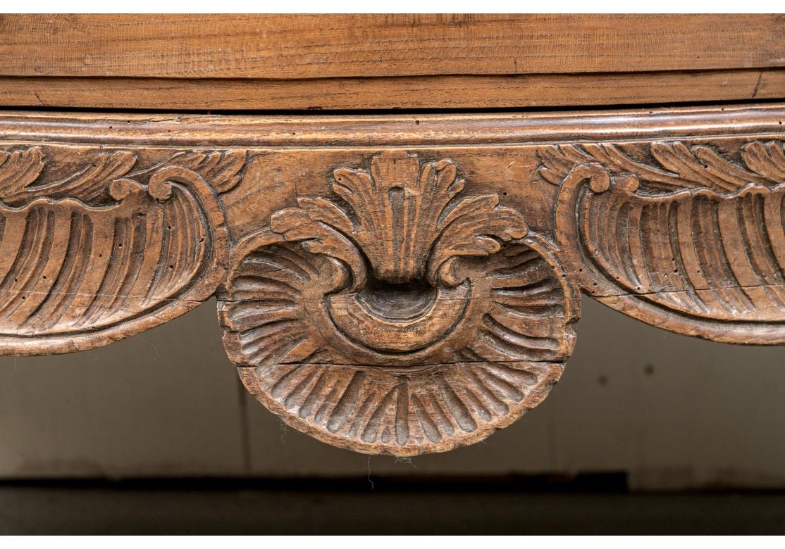 19th Century Antique French Walnut Commode With Elaborate Carved Pulls For Sale