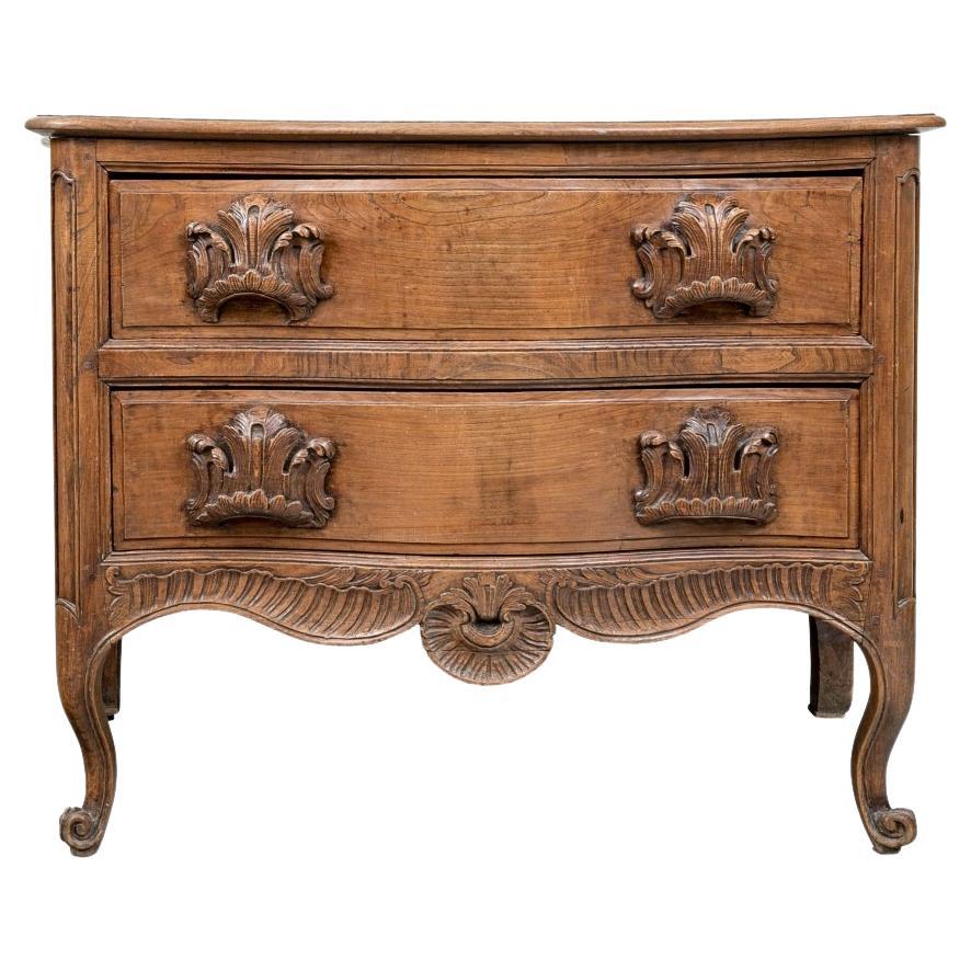 Antique French Walnut Commode With Elaborate Carved Pulls For Sale