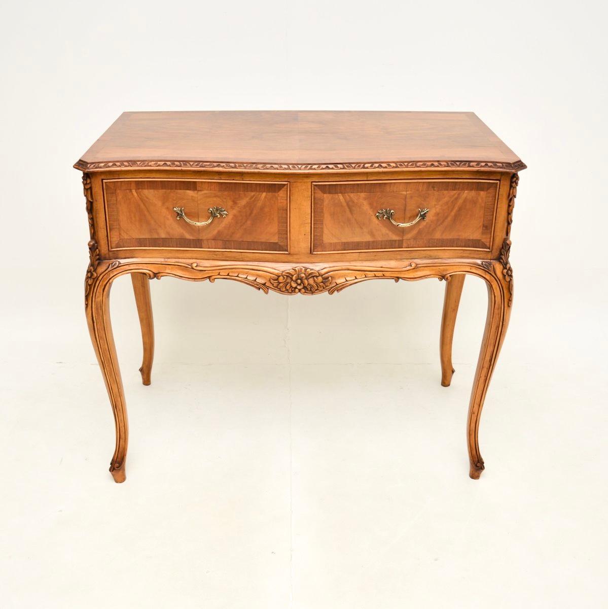 A beautiful and very well made antique French walnut console / server table. This was made in France, it dates from around the 1920’s.

The quality is outstanding, this is extremely well made and is a very useful size. It stands on cabriole legs
