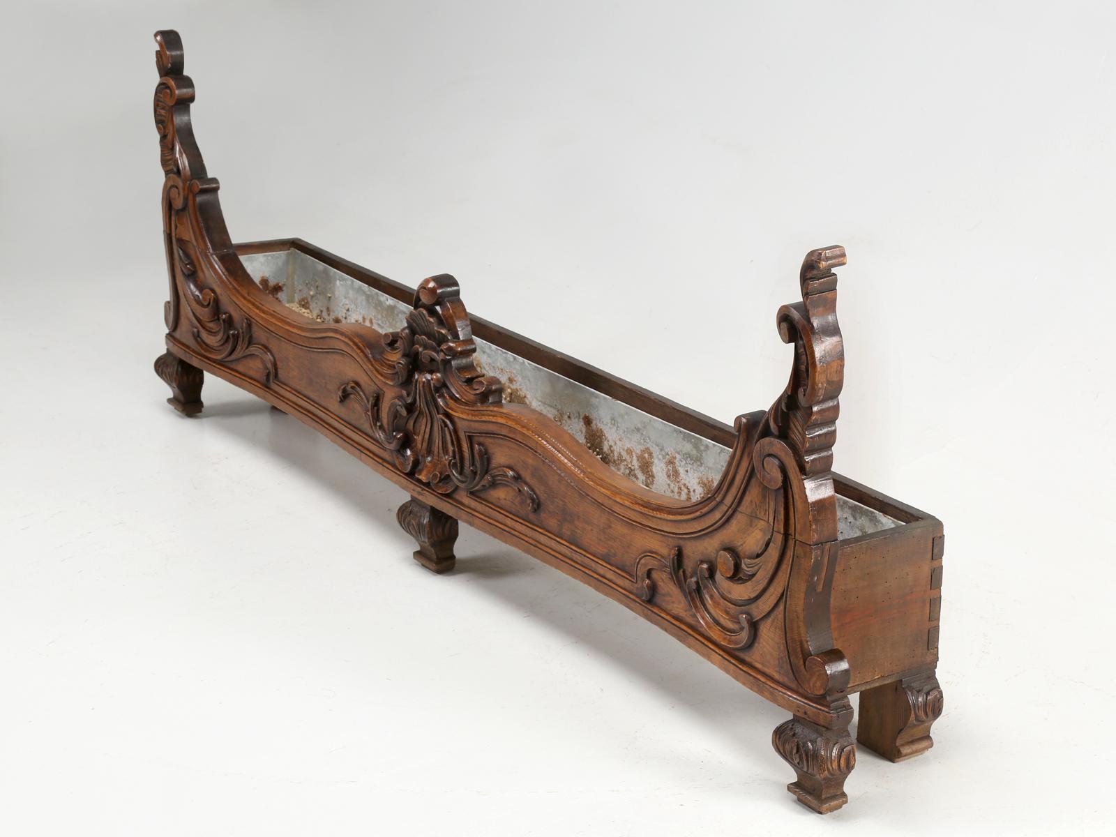 Jardinières, the French word for planter and this is an unusual antique French planter or jardinière, looks great in a front entry, as we have used it for the last 10 years, or in a hallway, or any place for that matter. Made of solid walnut with a