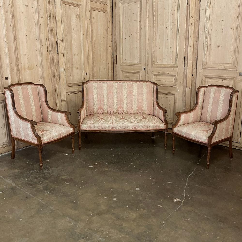 Antique French walnut Louis XVI canapé, sofa is part of an exquisite salon set which includes the pair of side chairs and pair of bergère (armchairs) you can view by clicking on the related products below left. This canapé, sold individually,