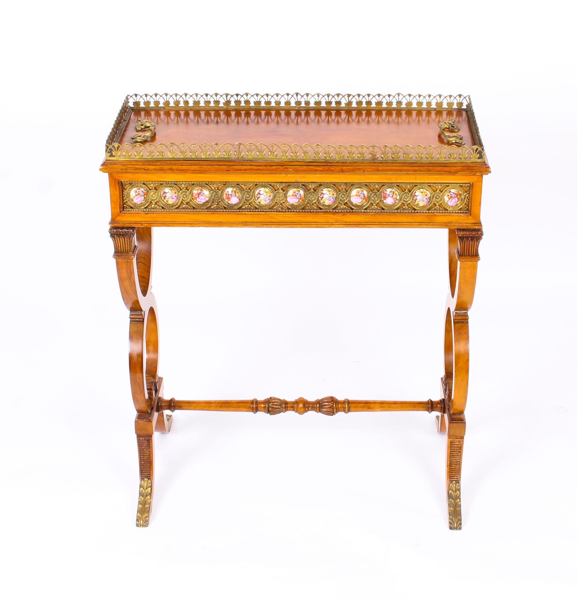 This is a truly splendid antique French ormolu and Sevres style porcelain mounted, walnut jardinière, circa 1870 in date.
 
This beautiful jardinière is rectangular in shape and features a superb pierced brass galleried top with a removable lid