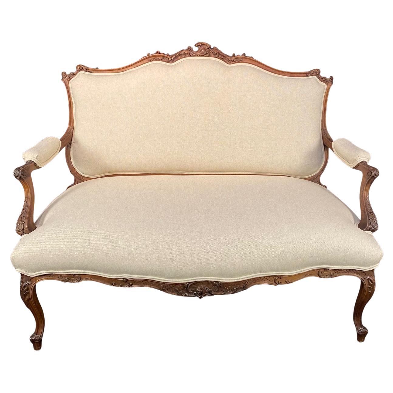 Antique French Walnut Sofa with Museum Quality Carving and New Upholstery