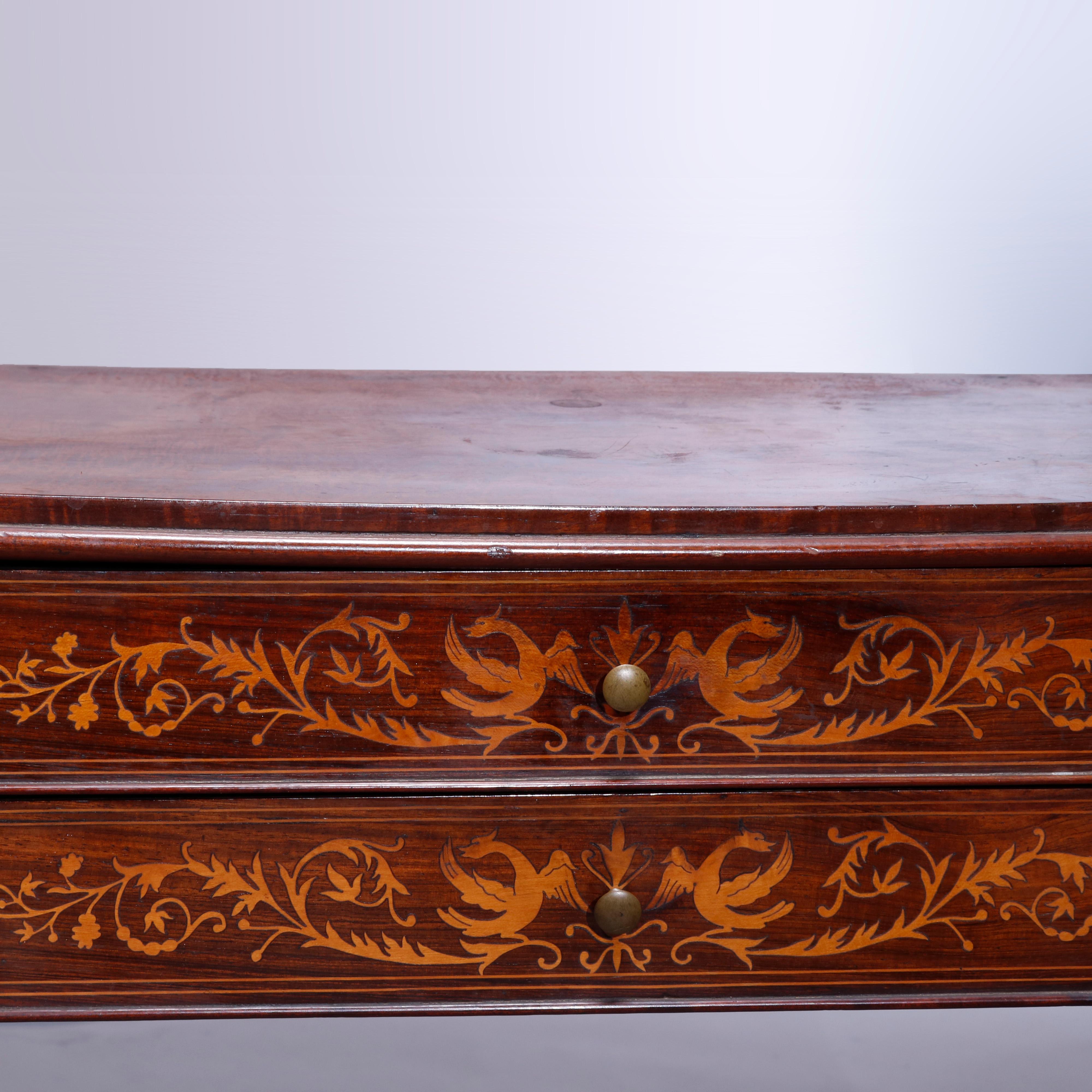 An antique French server offers walnut construction with beveled top over case with two drawers, each having floral and foliate satinwood marquetry inlay, raised on square tapered legs, c1880

Measures: 31.5