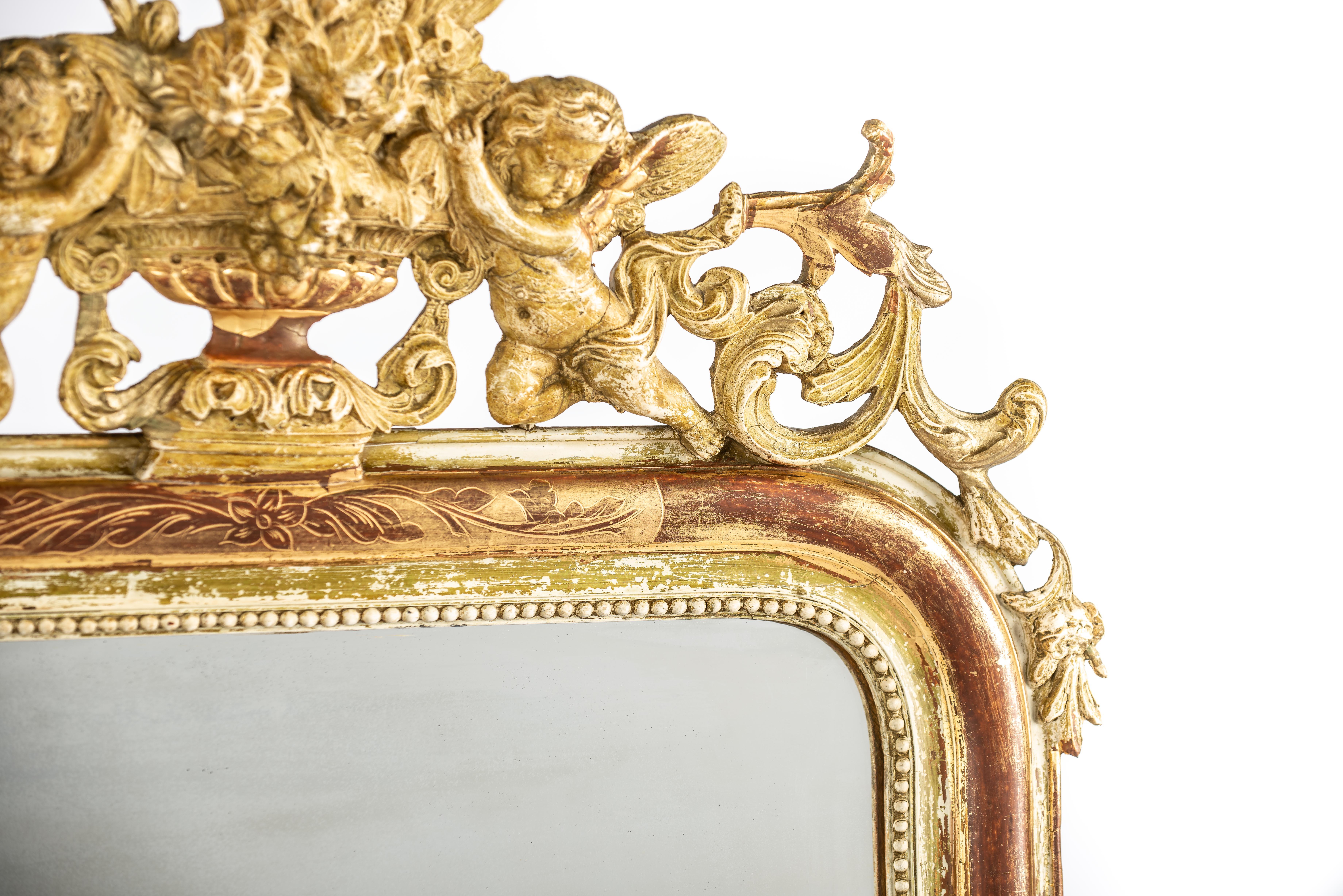 Gilt Antique French weathered gold gilt Louis Philippe mirror with angels or putti