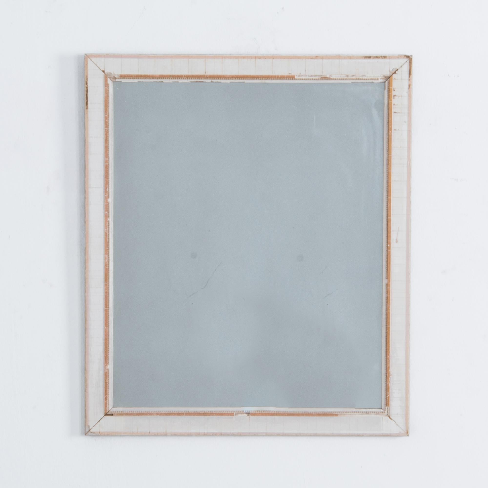 From France, circa 1900 this pared down white frame charms in spaces simple or ornate. Inset with traditional plaster molding, painted, and carefully gold-leafed, this frame blends delicate ornament and traditional technique for a restrained and