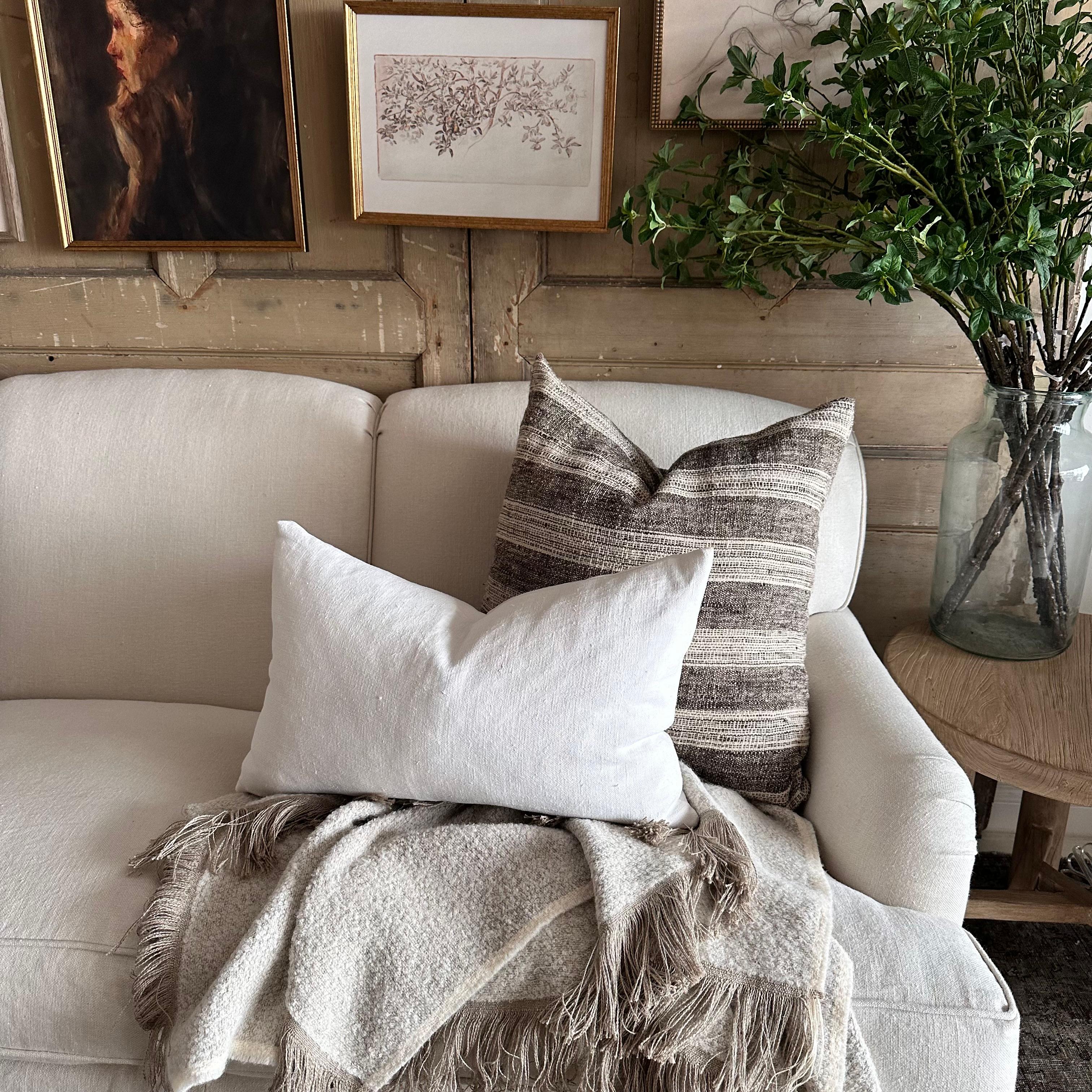 Antique French linen textile pillow with seam 0ff- white antique French linen textured grain sack pillow with original seam, backside is in a similar or same antique material.

Our linens are pre-washed ready for use. Please note that these fabrics