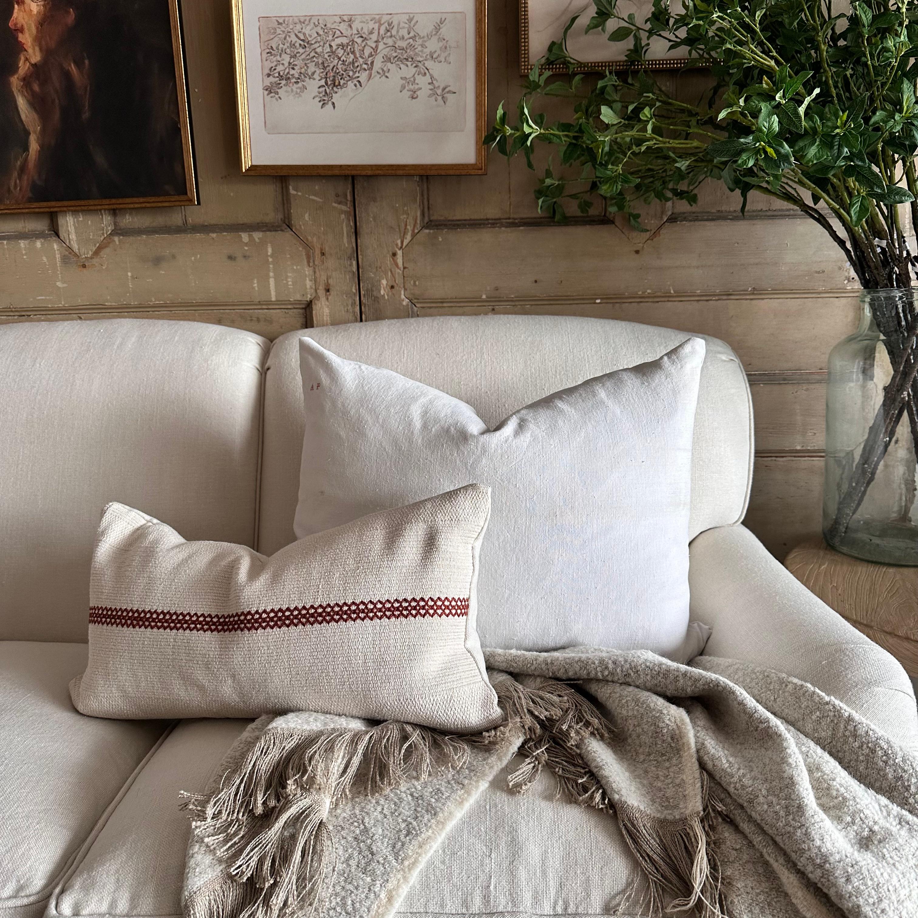 Antique French linen textile pillow with seam 0ff- white antique French linen textured grain sack pillow with original seam, backside is in a similar or same antique material.

Our linens are pre-washed ready for use. Please note that these fabrics