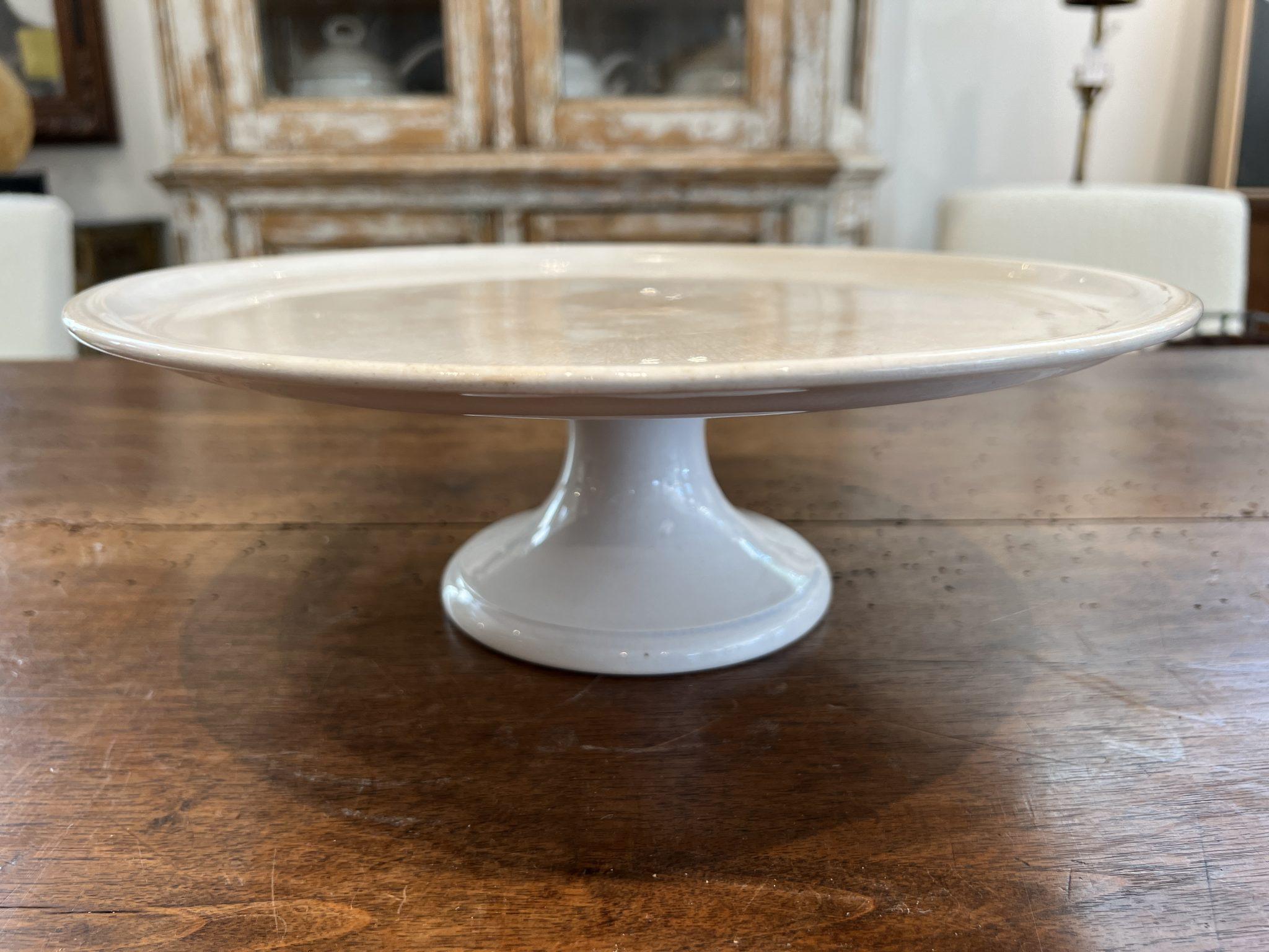 Present a cake or petite fours on this charming footed platter