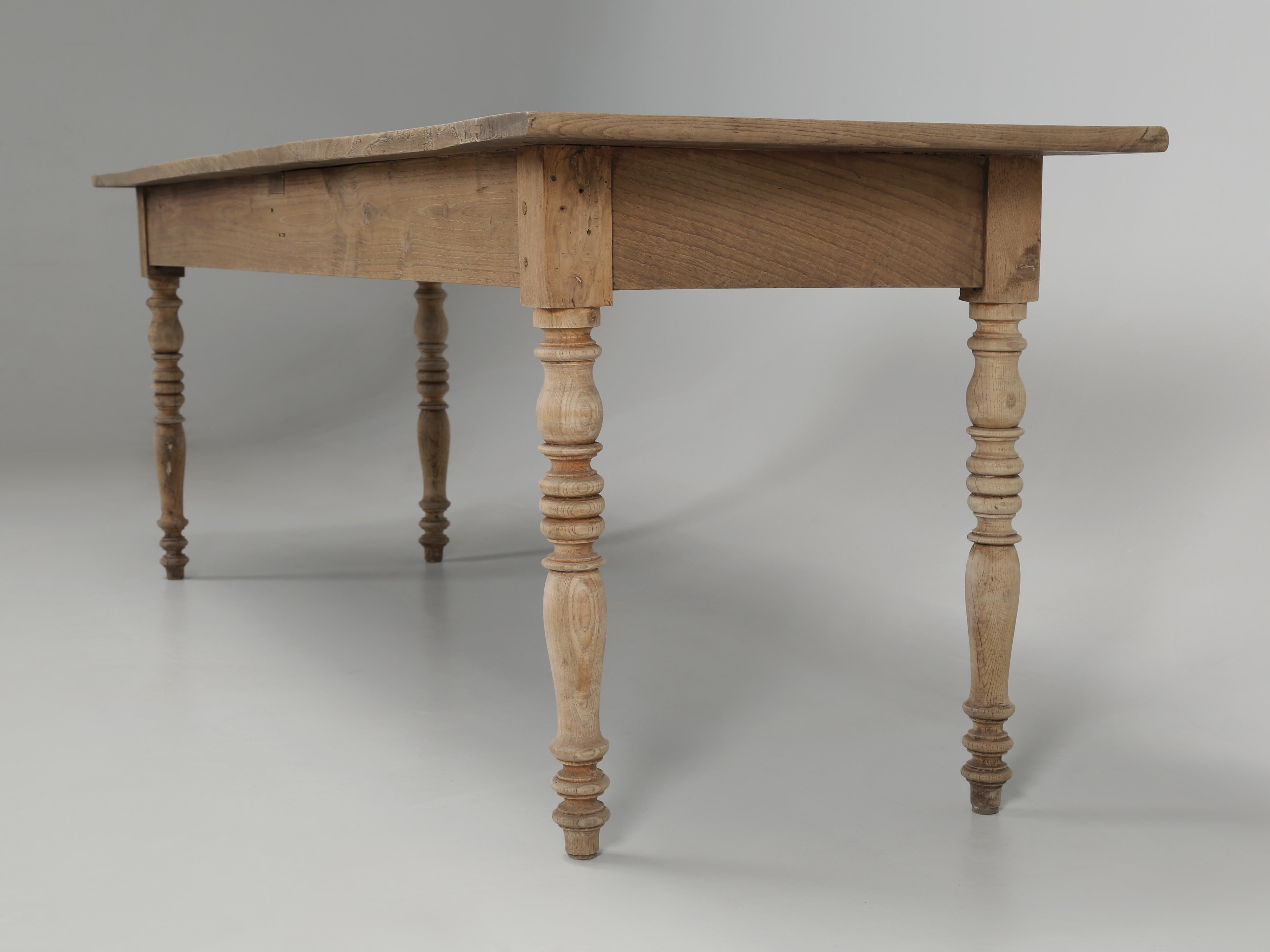 Antique French farm table dating from the 1800s. This antique French white oak farm table could be older based on the height and before we go and raise the height to modern standards, we thought we’d wait to see what the client would prefer. Antique