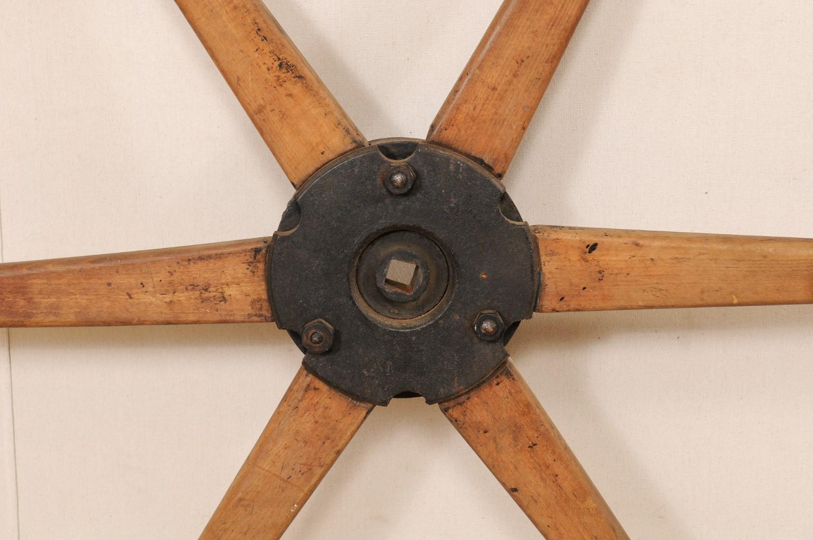 Antique French Wood and Iron Industrial Wheel from the Early 20th Century 3