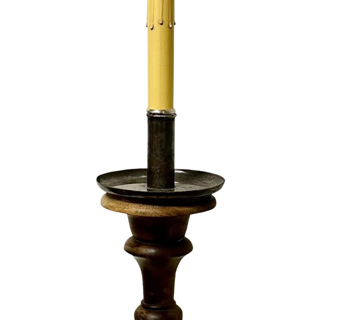 A single wood candlestick converted into a lamp with a new cord, plug and harp. France, circa 1890s.