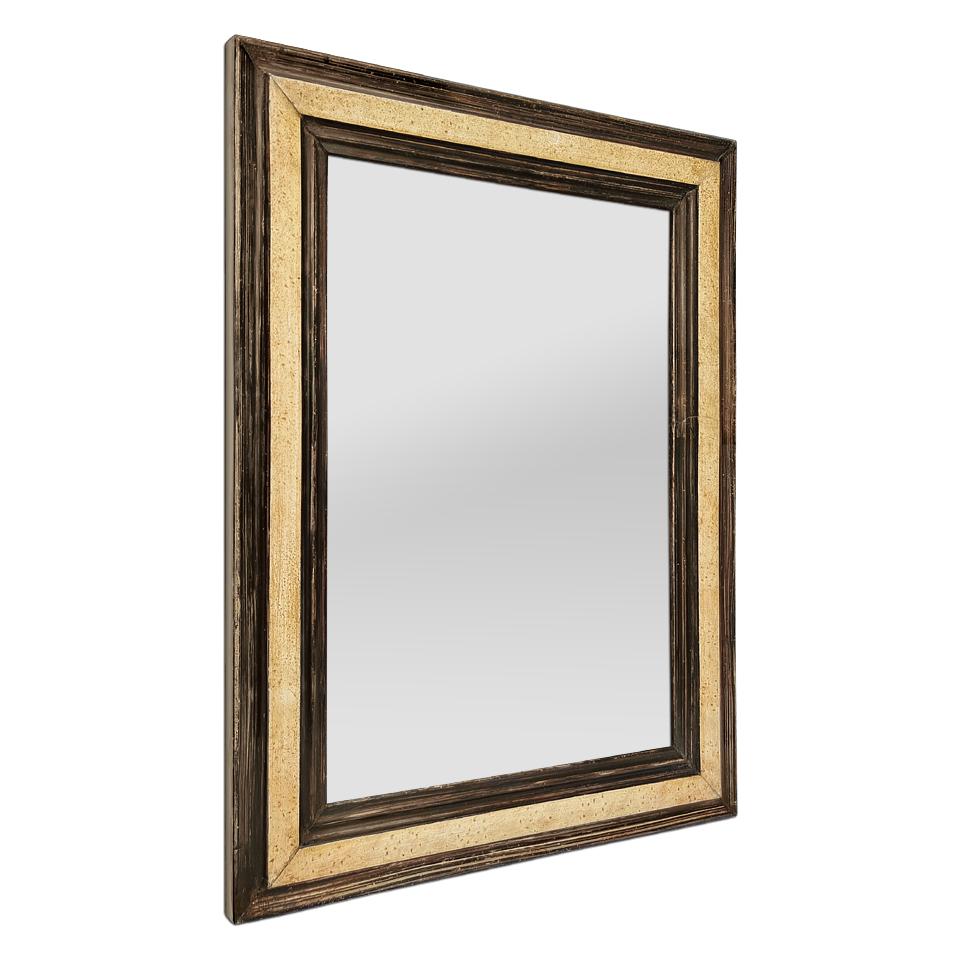 Antique French wood mirror Flemish style inspiration, circa 1880. Antique frame with hand-painted imitation wood decoration in beige and light brown patina colors (Frame width: 5.5 cm - 2.16 in.) Modern glass mirror. Antique wood back.