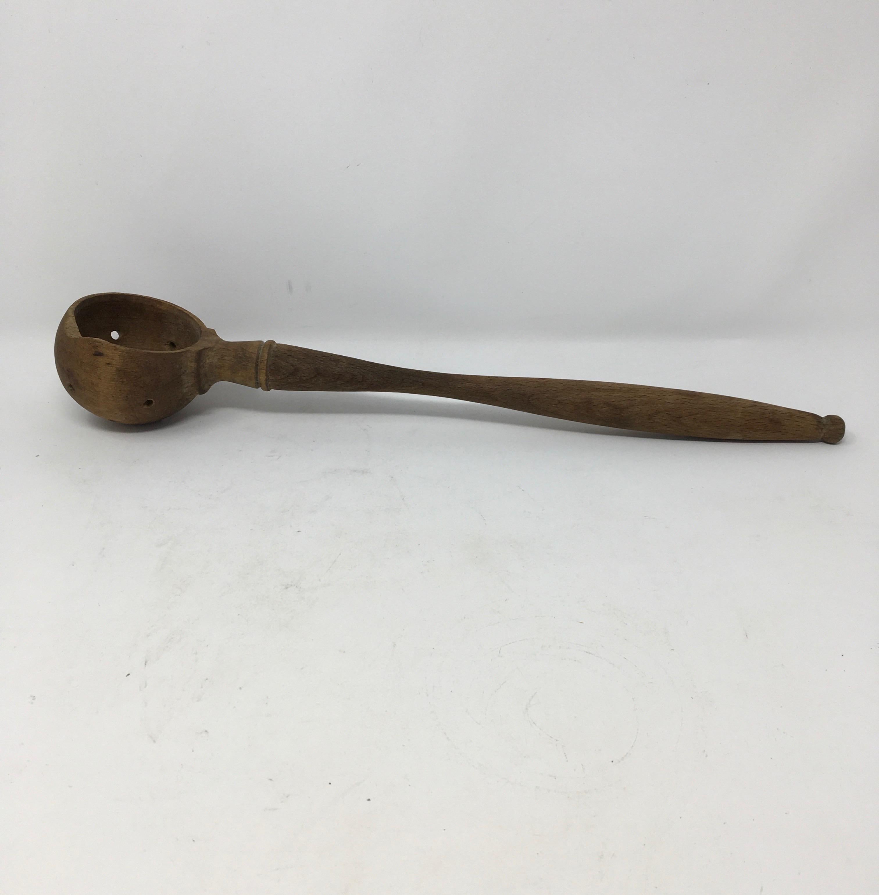 Found in the South of France, this olive spoon was used to scoop olives from large preserving jars. These spoons are a French tool that one would see everywhere from market stalls to well equipped homes throughout the southern region of France.
