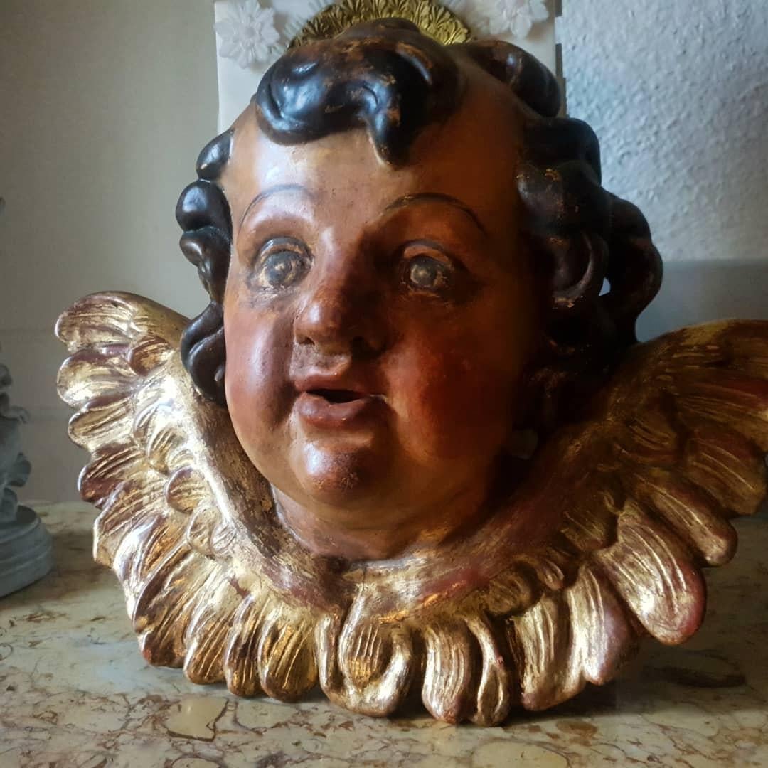 Unique Antique Wooden Cherub Bust

Antique Wood Cherub Head Carving

Authentic

Tete d Angelot

Composite & Giltwood

Beautiful Carved Details

Circa 1850

Curiously Decorated Cherub/Putti Bust

Lovely Condition

Antique