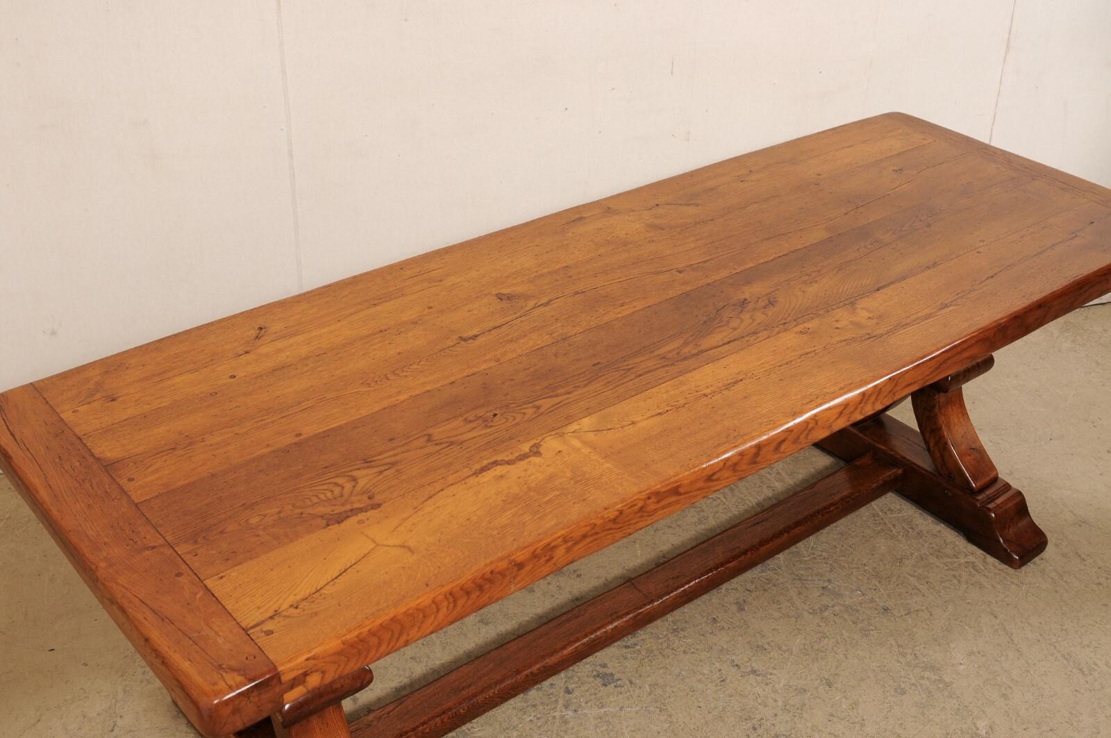 20th Century Antique French Wooden Dining Table w/Nicely Carved Trestle Legs, 7+ Ft Long For Sale