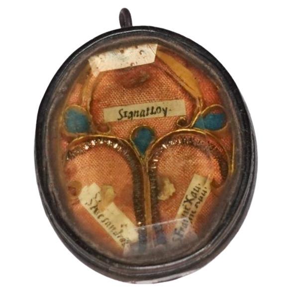 Antique French Wooden Reliquary Medallion Containing Relics For Sale