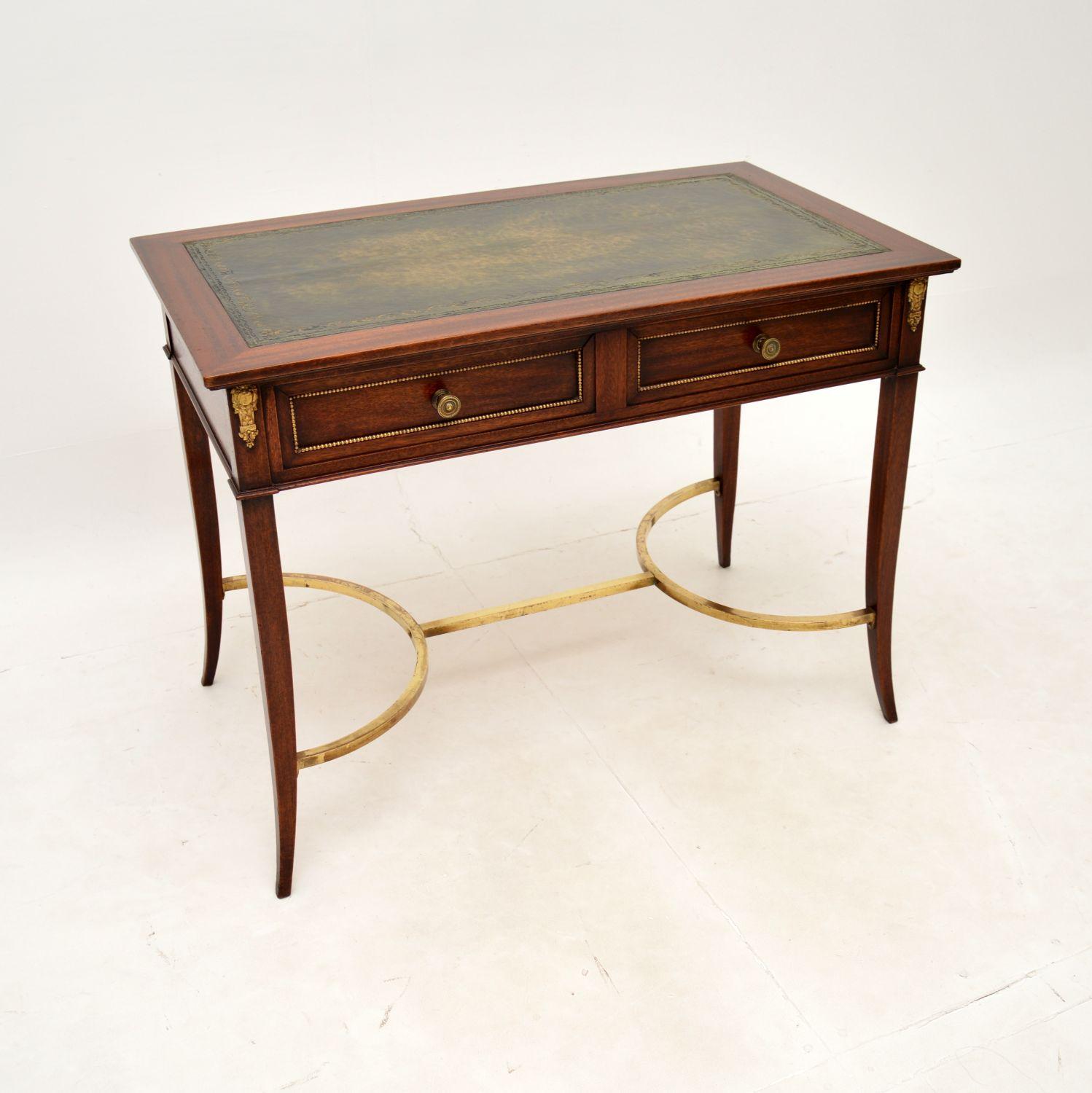 A beautifully designed and extremely well made antique French writing desk. This was made in France, it dates from around the 1930’s.

The quality is outstanding, this has beautiful ormolu mounts, intricate and high quality brass handles and a brass