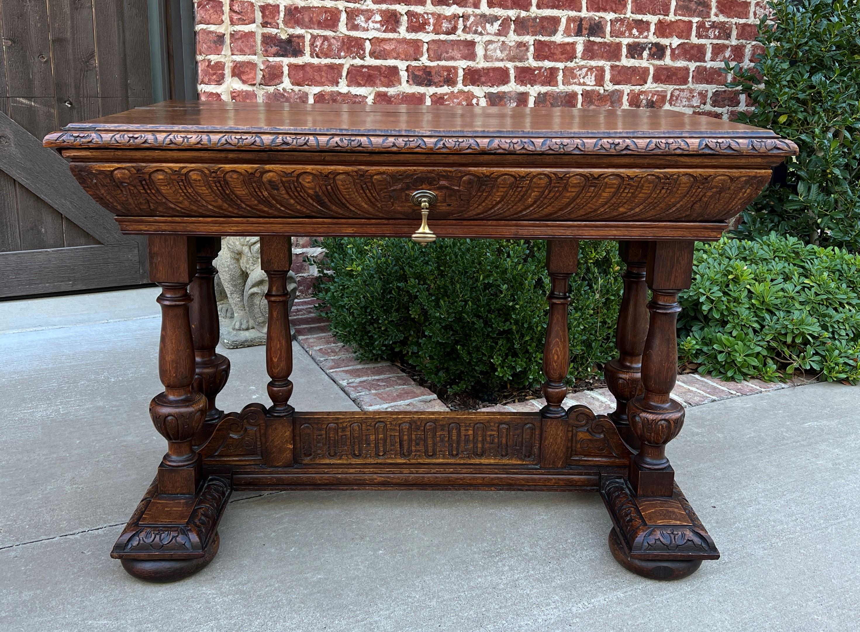 Beautiful versatile size antique French oak renaissance revival writing desk or table with drawer and double pedestal.
~~c. 1890

With so many people working from home now, DESKS have become our most often requested items this year~~this is a