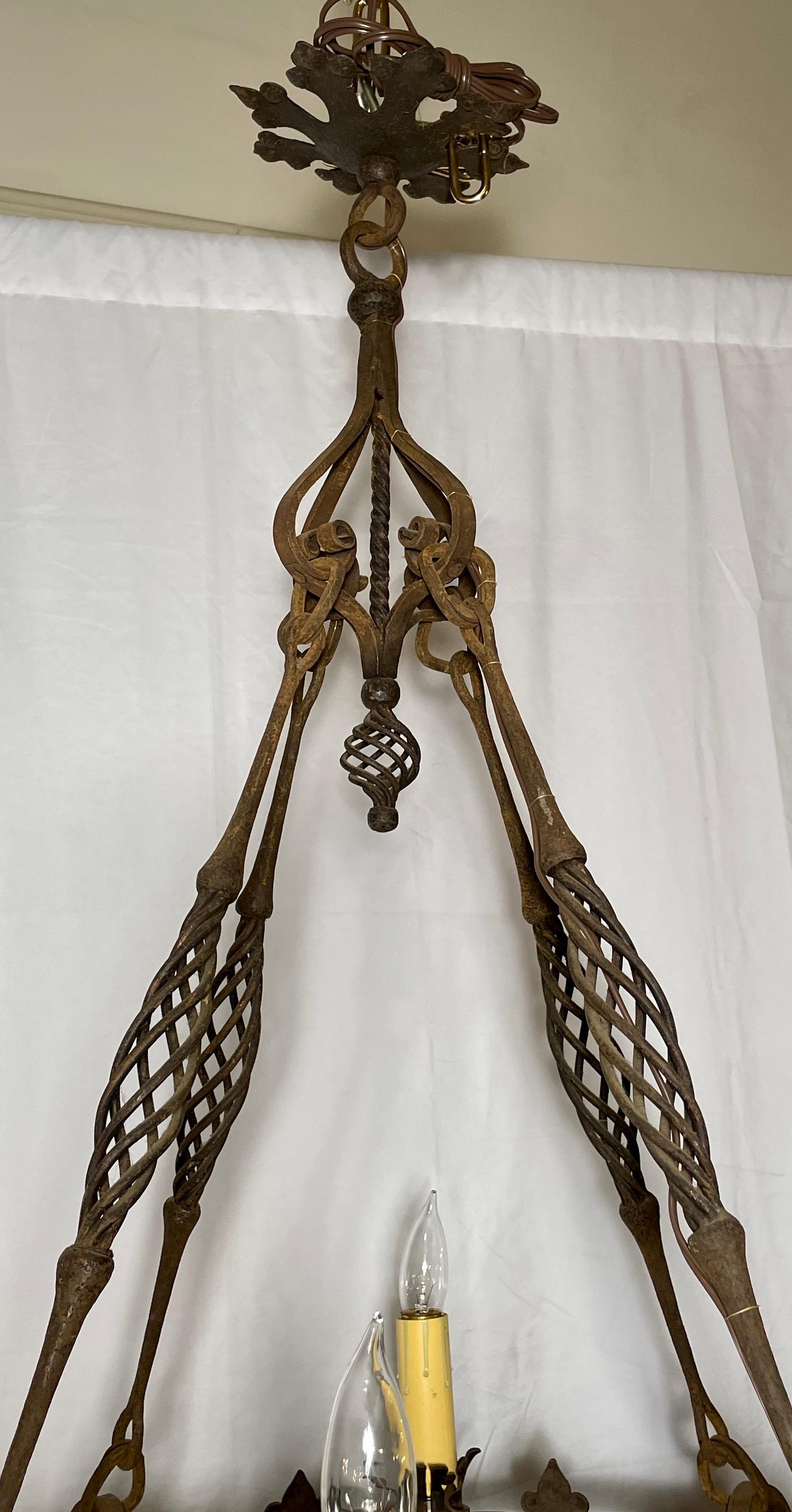 Antique French wrought iron 4 light chandelier, circa 1880.