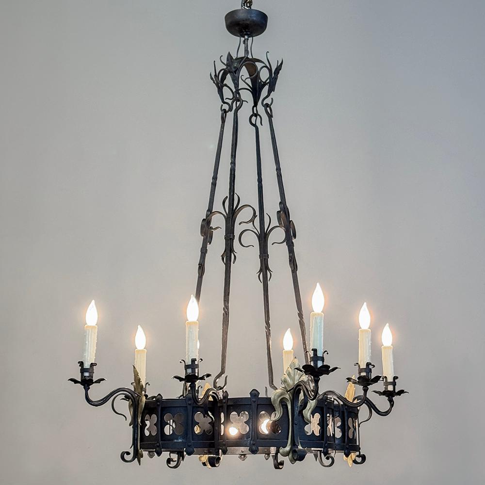 
Antique French Wrought Iron Chandelier is a superlative example of the master metalsmith's art!  Forged from red hot iron from top to bottom, the fixture includes its original canopy.  (It will require minor work to add chain)  Starting just under