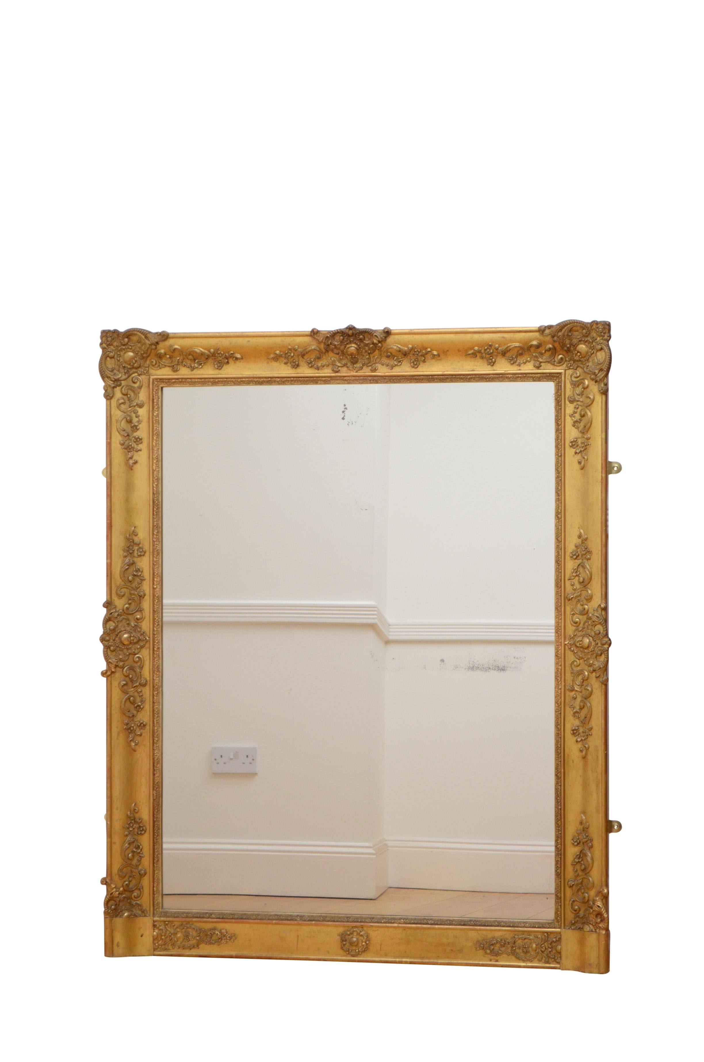 K0460 excellent French overmantel mirror / wall mirror with original foxed glass in cushion moulded and scroll decorated giltwood frame. This antique mirror retains its original glass, gilt and backboards, all in excellent home ready condition,