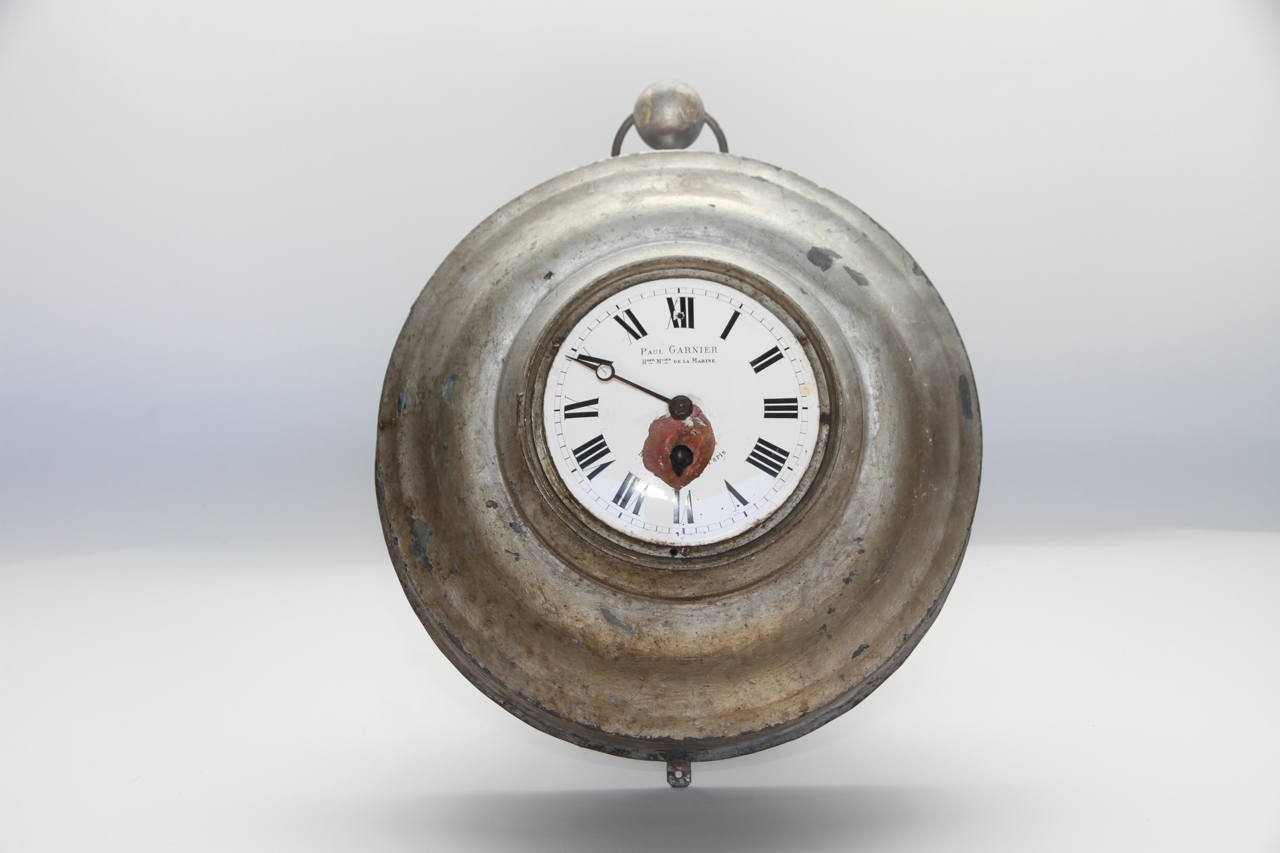 An antique French wall clock. Made of zinc the 6.25