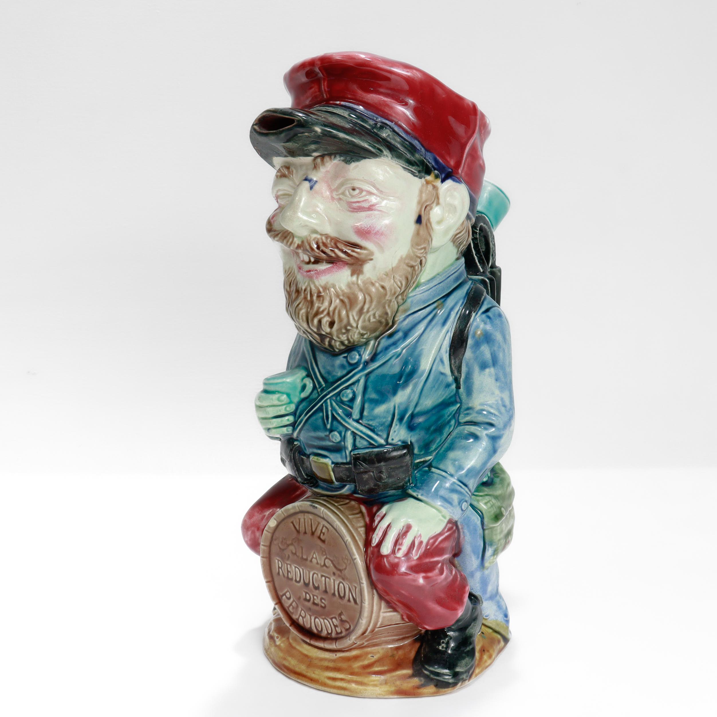 Belle Époque Antique Frie Onnaing Satirical French Majolica Drunken Soldier Toby Pitcher For Sale