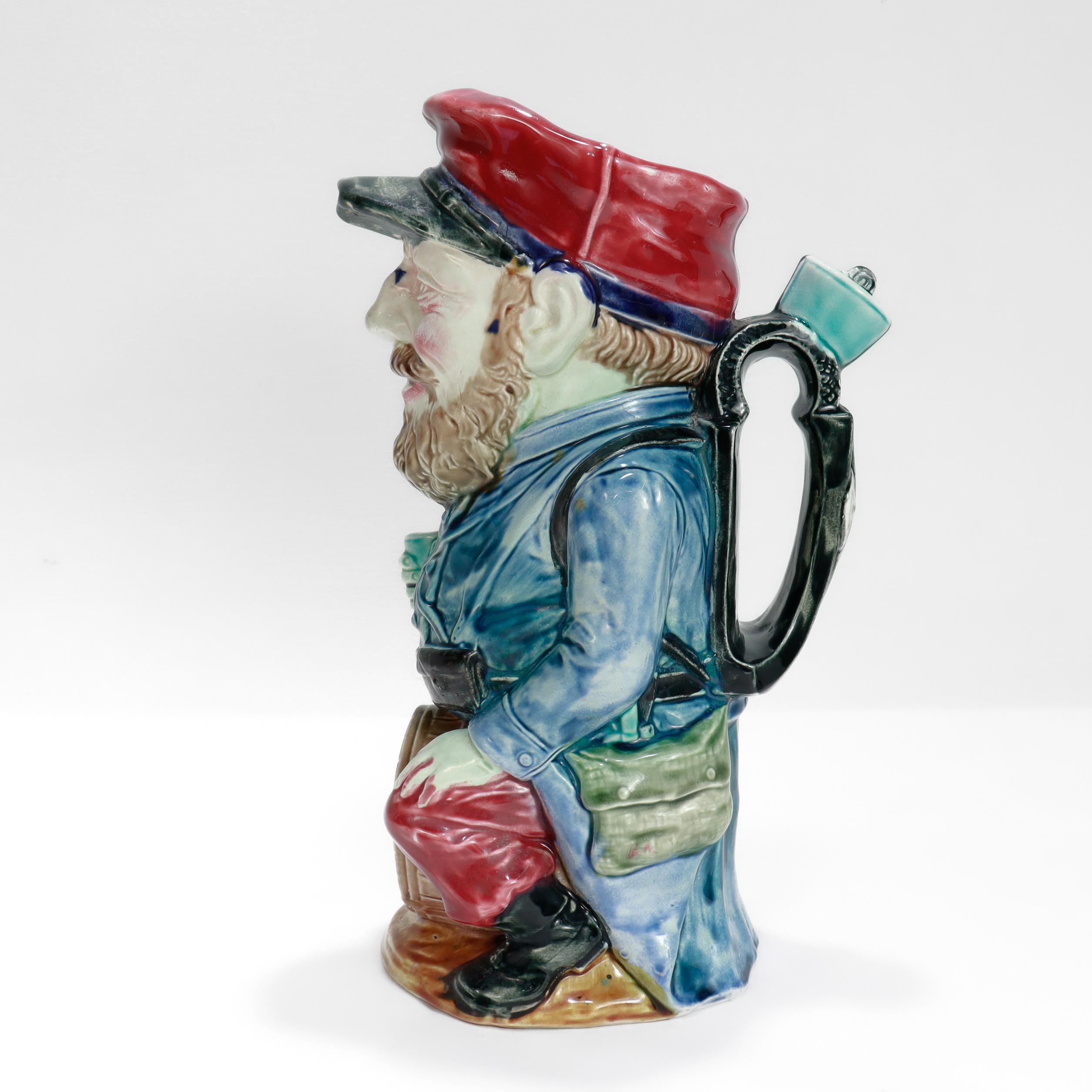 Antique Frie Onnaing Satirical French Majolica Drunken Soldier Toby Pitcher In Good Condition For Sale In Philadelphia, PA