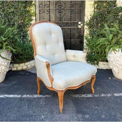 Fauteuil bergère ancien en bois fruitier, 18ème siècle