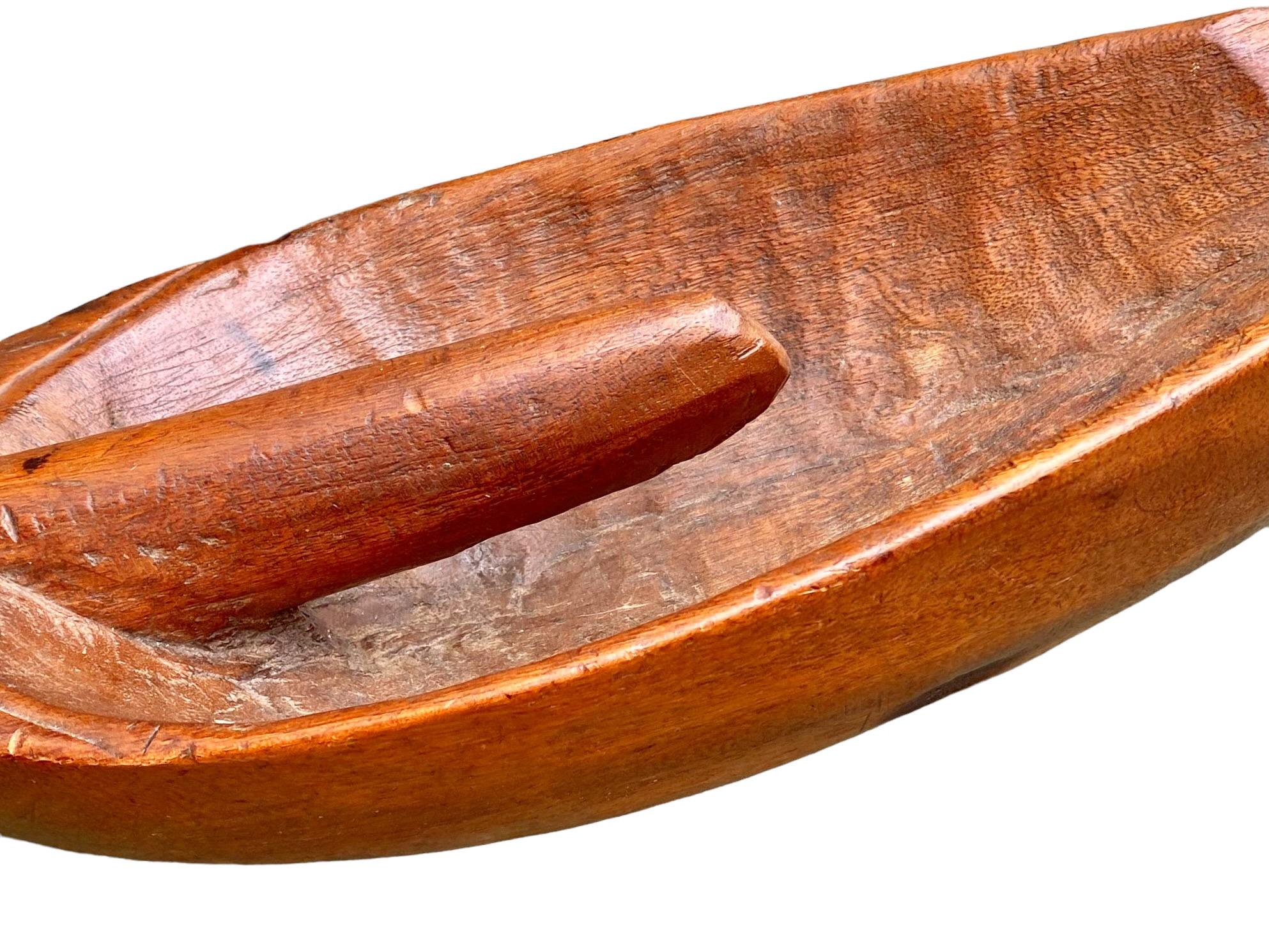 Full of character and rich in history, this antique French Provincial fruitwood grain scoop was once simply utilitarian, used to shovel oats into sacks. This fruitwood scoop has a lovely warm oxidized brown finish and the hand carved texture of the