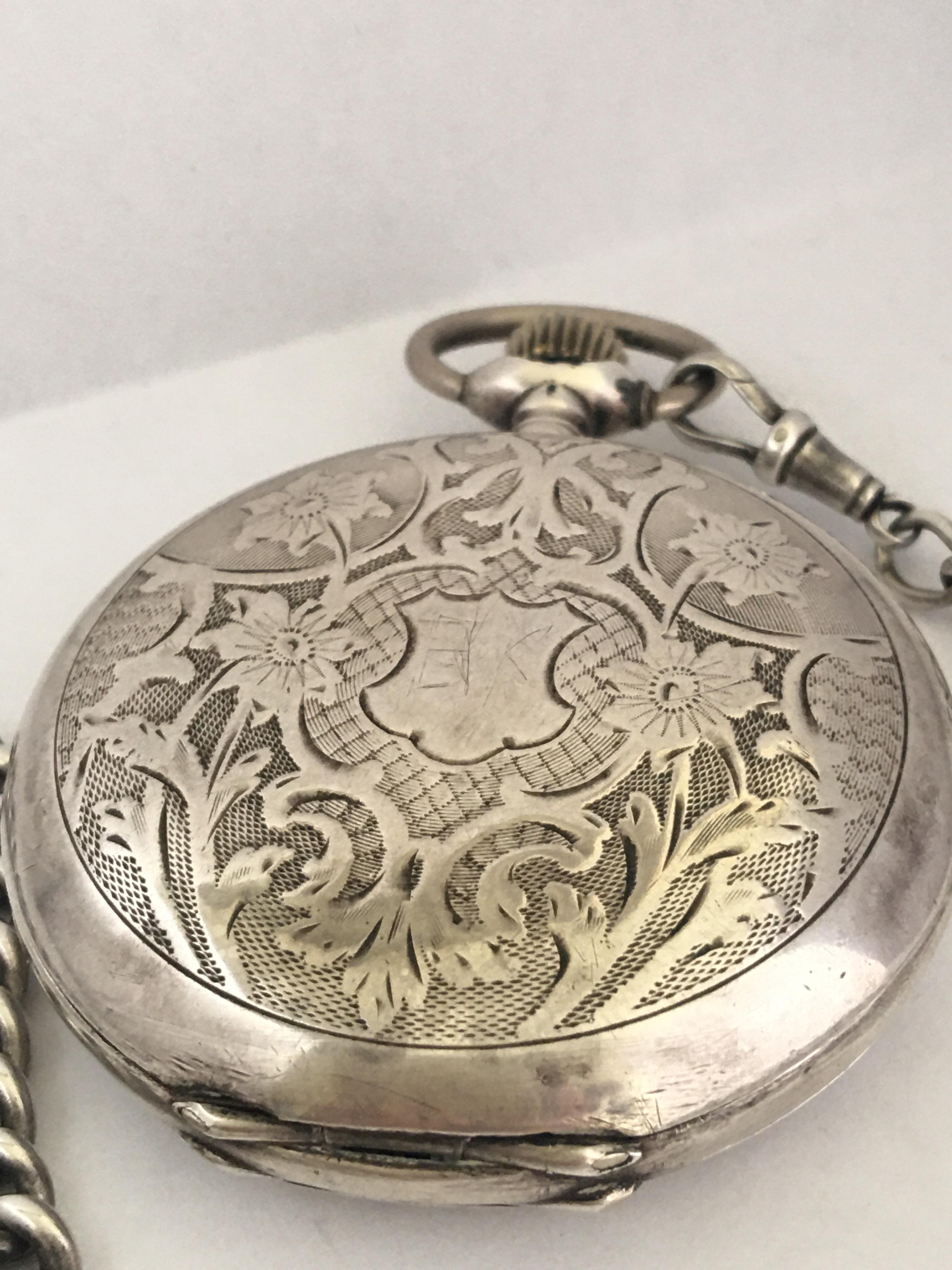 This beautiful stem winding antique silver pocket watch is in good working condition and it running accurately. Watch diameter is 58mm.

It comes with an Albert graduated Silver Pocket watch chain which each link has a silver hallmarks 12.5inches