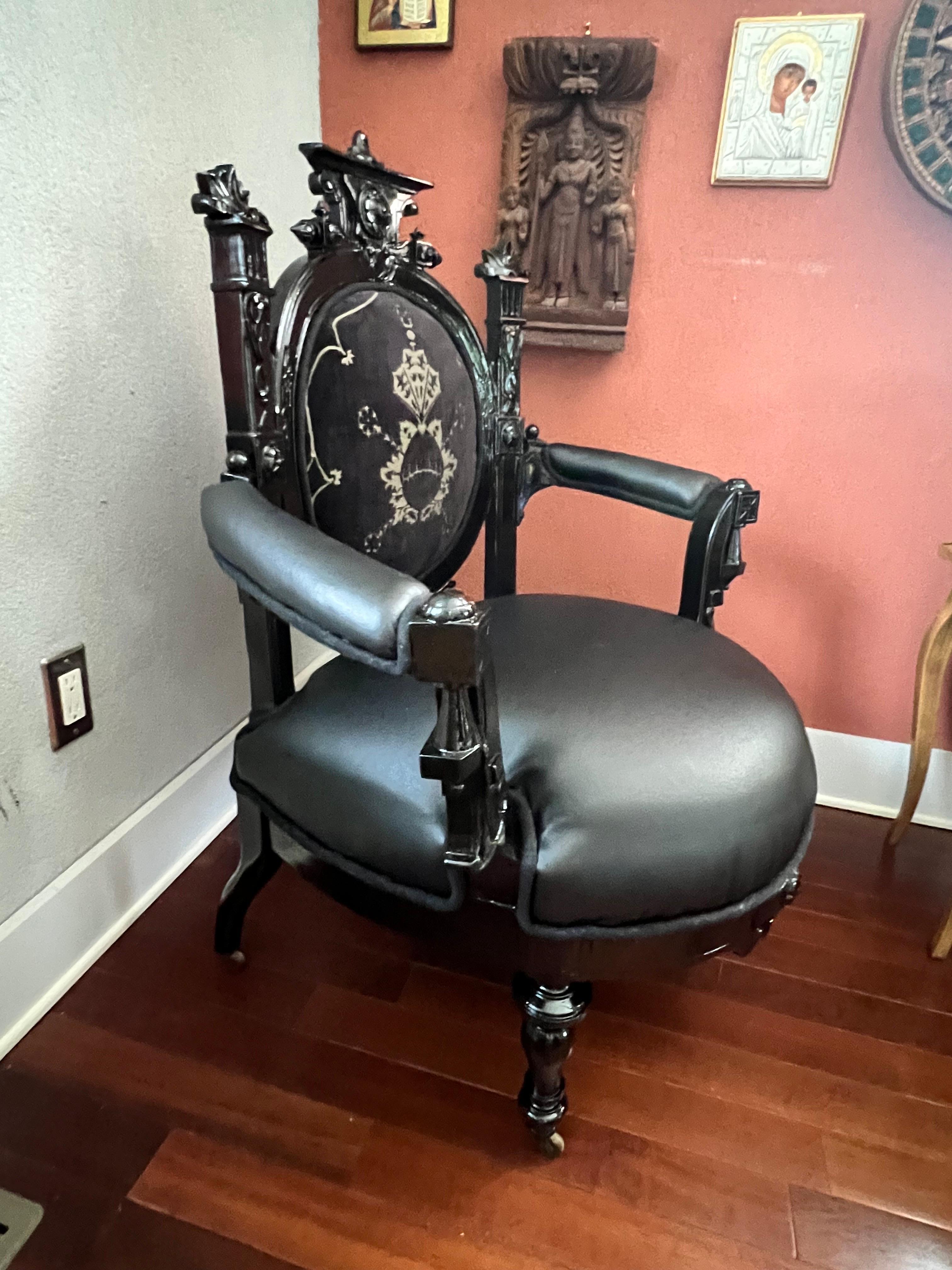 Stunning Antique Chair that has been fully restored. Black Leather seat and velvet back  gives this oversized chair a throne style that’s is so unique
if you are looking to add a one of kind chair as   focal point to any room this chair is perfect