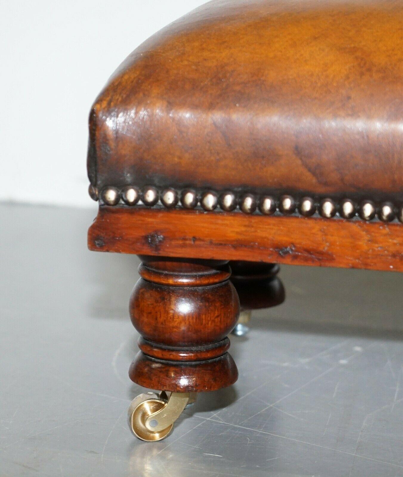20th Century Antique Fully Restored Hand Dyed Whisky Brown Leather Footstool Brass Castors