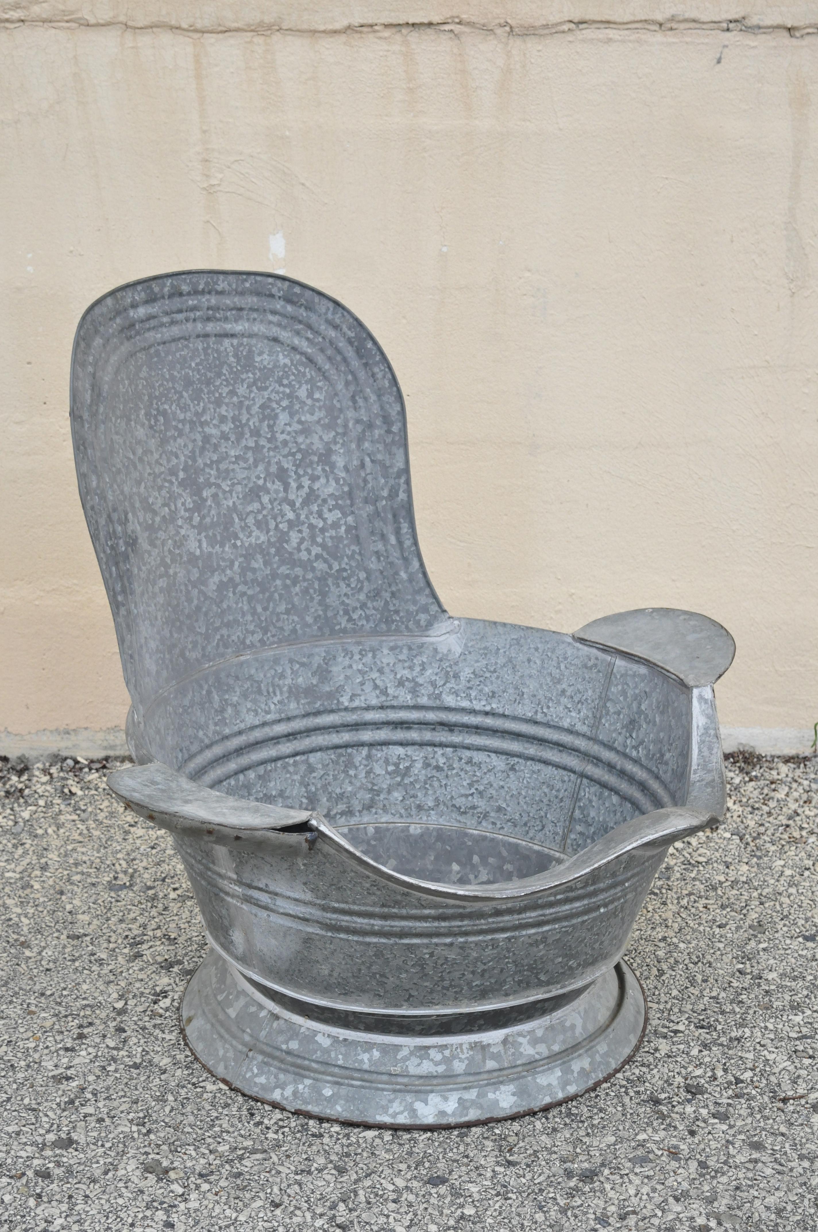 Antique galvanized metal tin cowboy bathtub sit down hip tub with back. Item is a very rare antique item. Circa late 19th - early 20th century. Measurements: 28