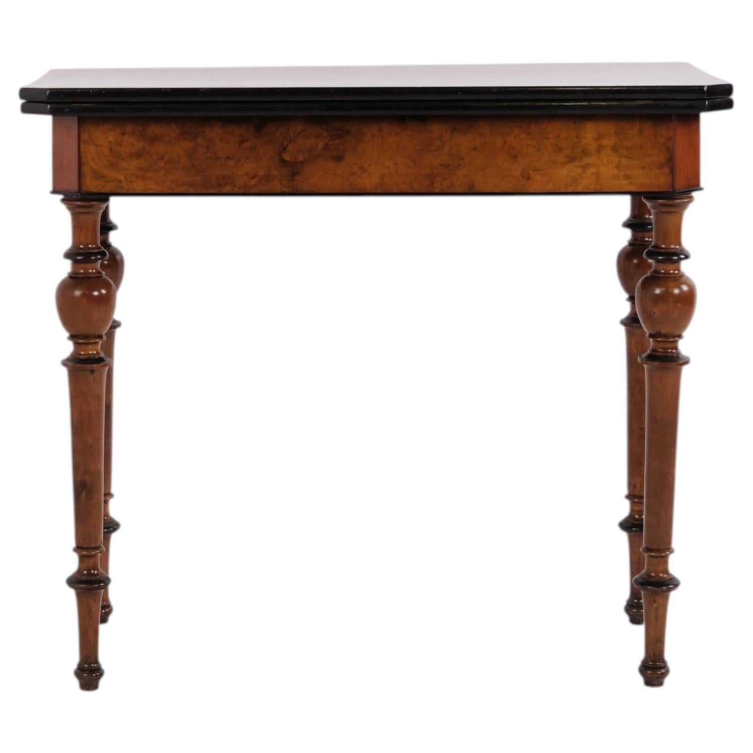 Antique games table in mahogany and walnut with brass fittings from the 1860s